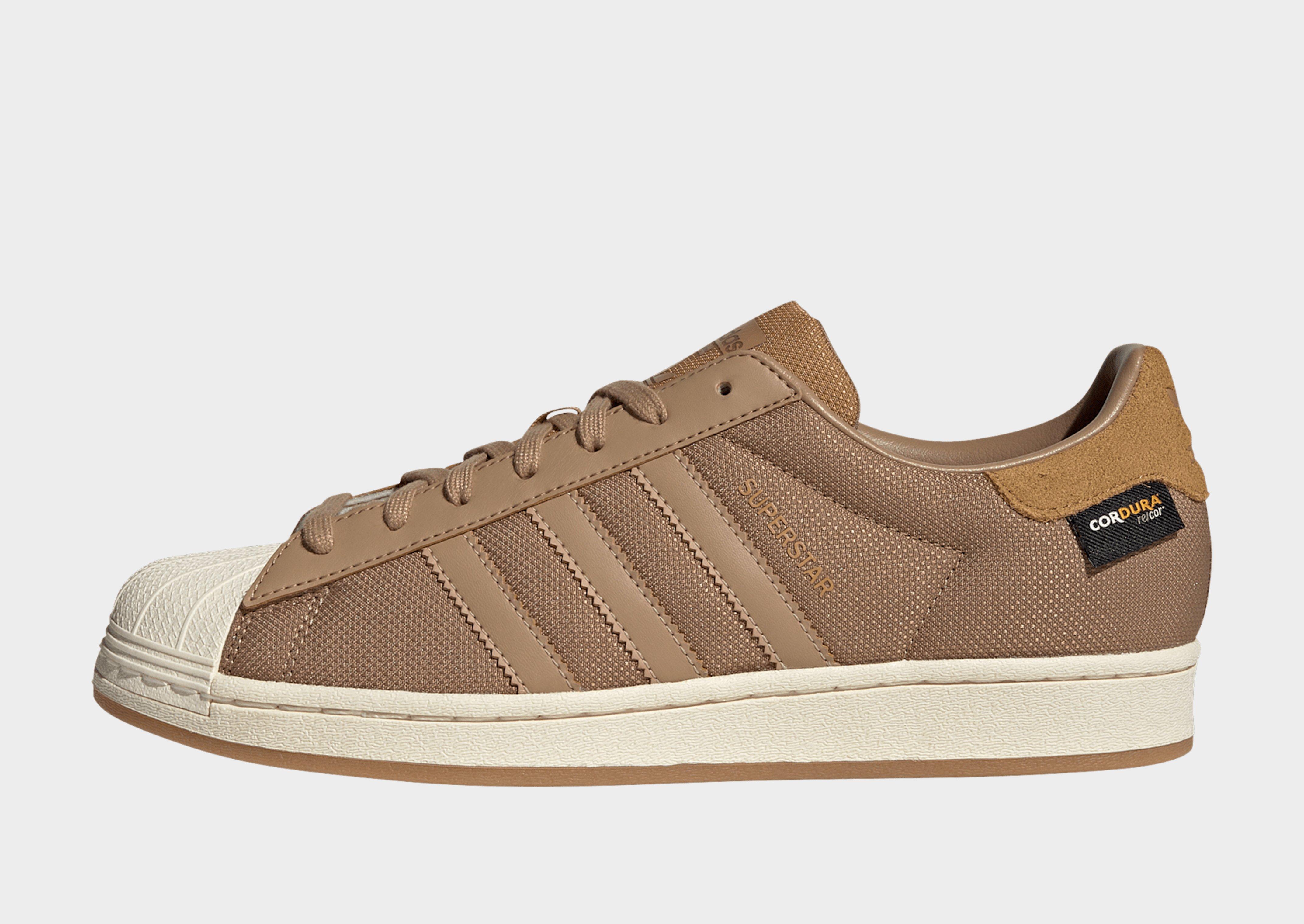 Adidas superstar gold nose sale