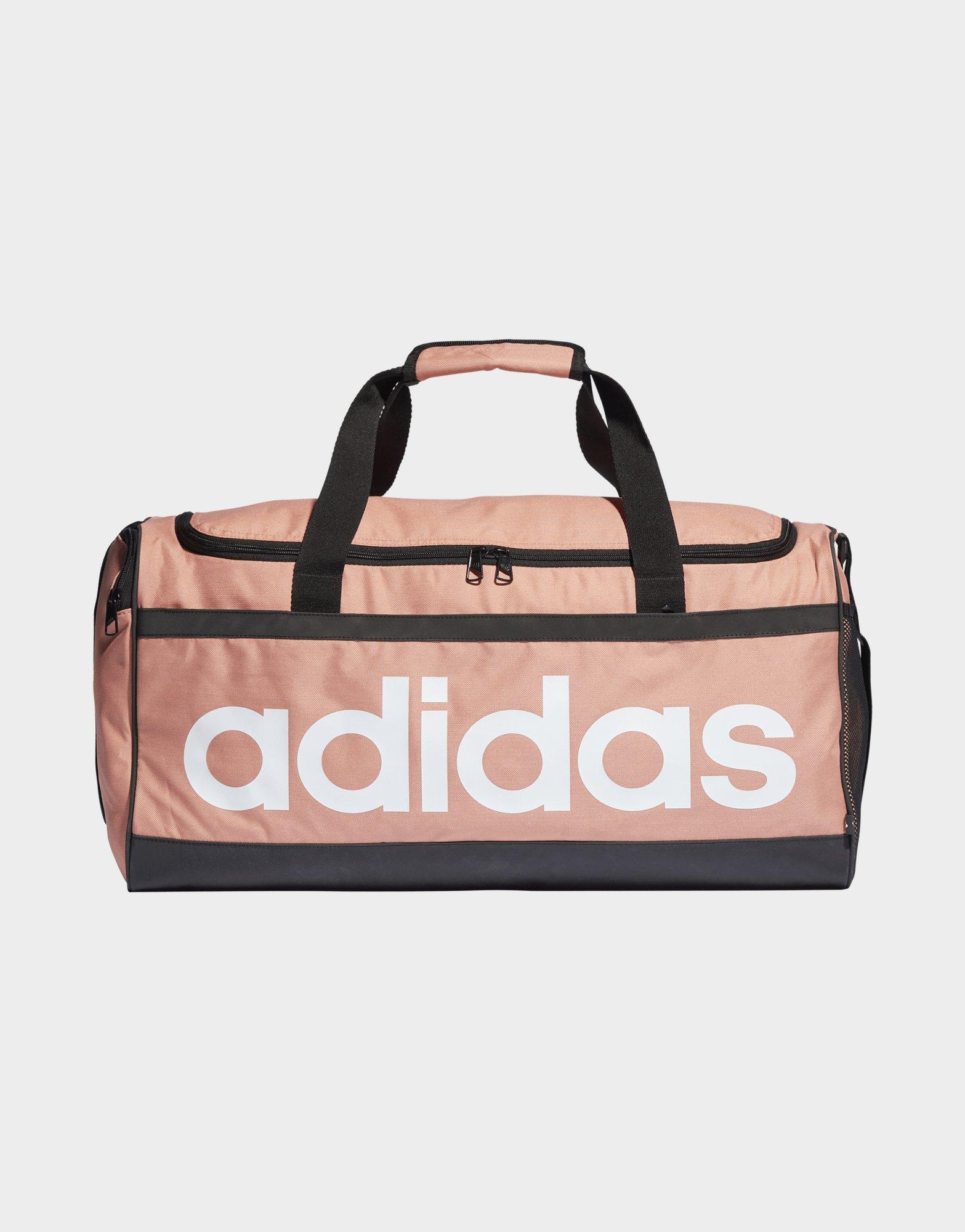 Red adidas Essentials Linear Duffel Bag Medium | JD Sports UK