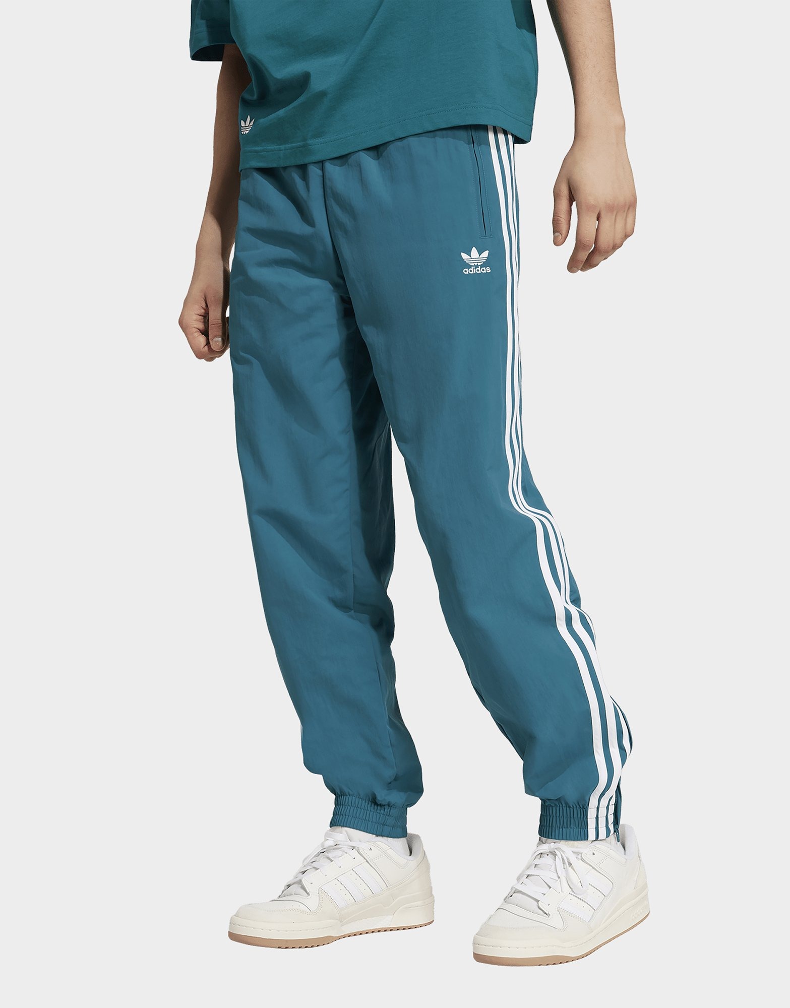 Turquoise adidas Adicolor Woven Firebird Track Pants | JD Sports UK