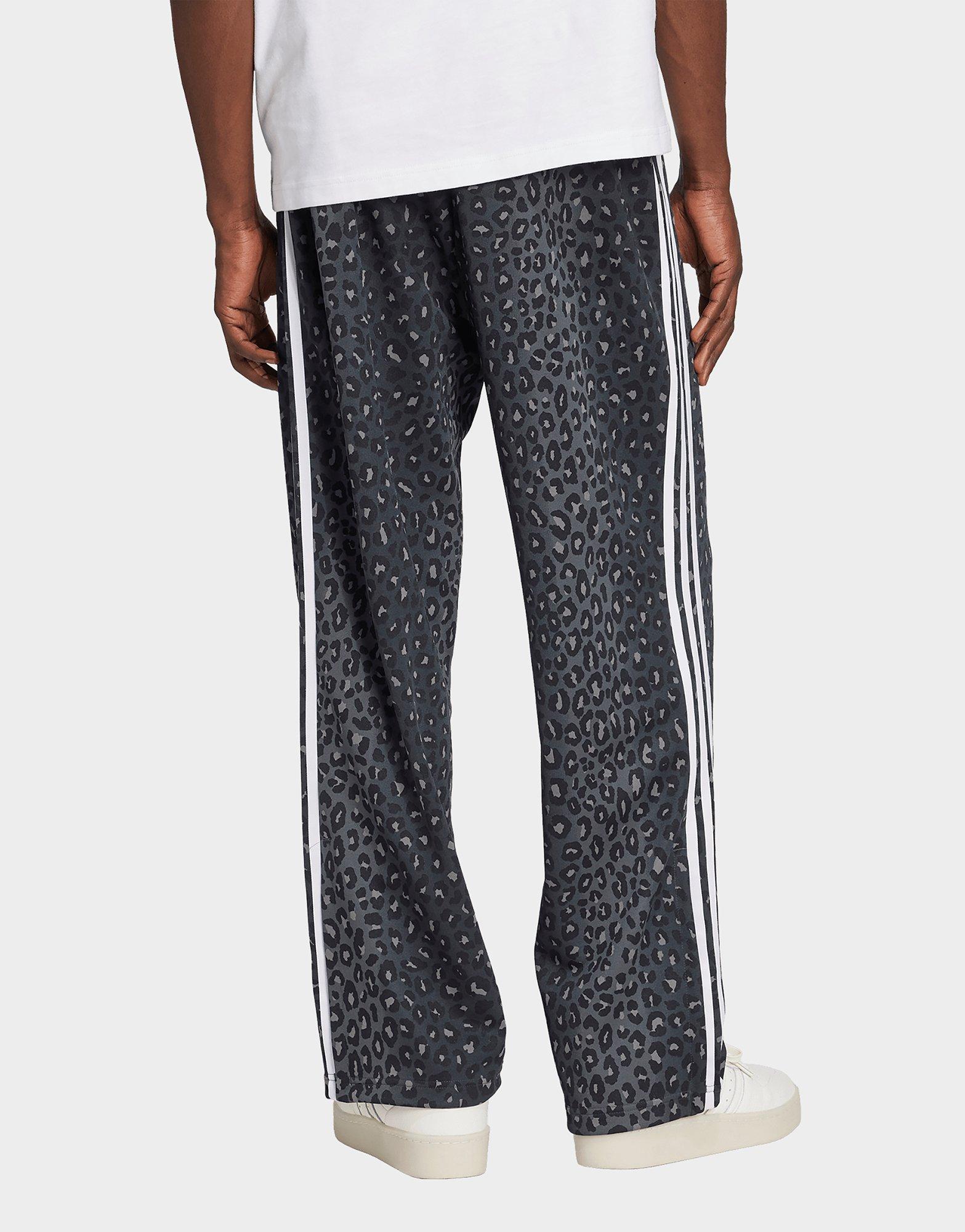 adidas Pantalon de survêtement ample léopard Firebird
