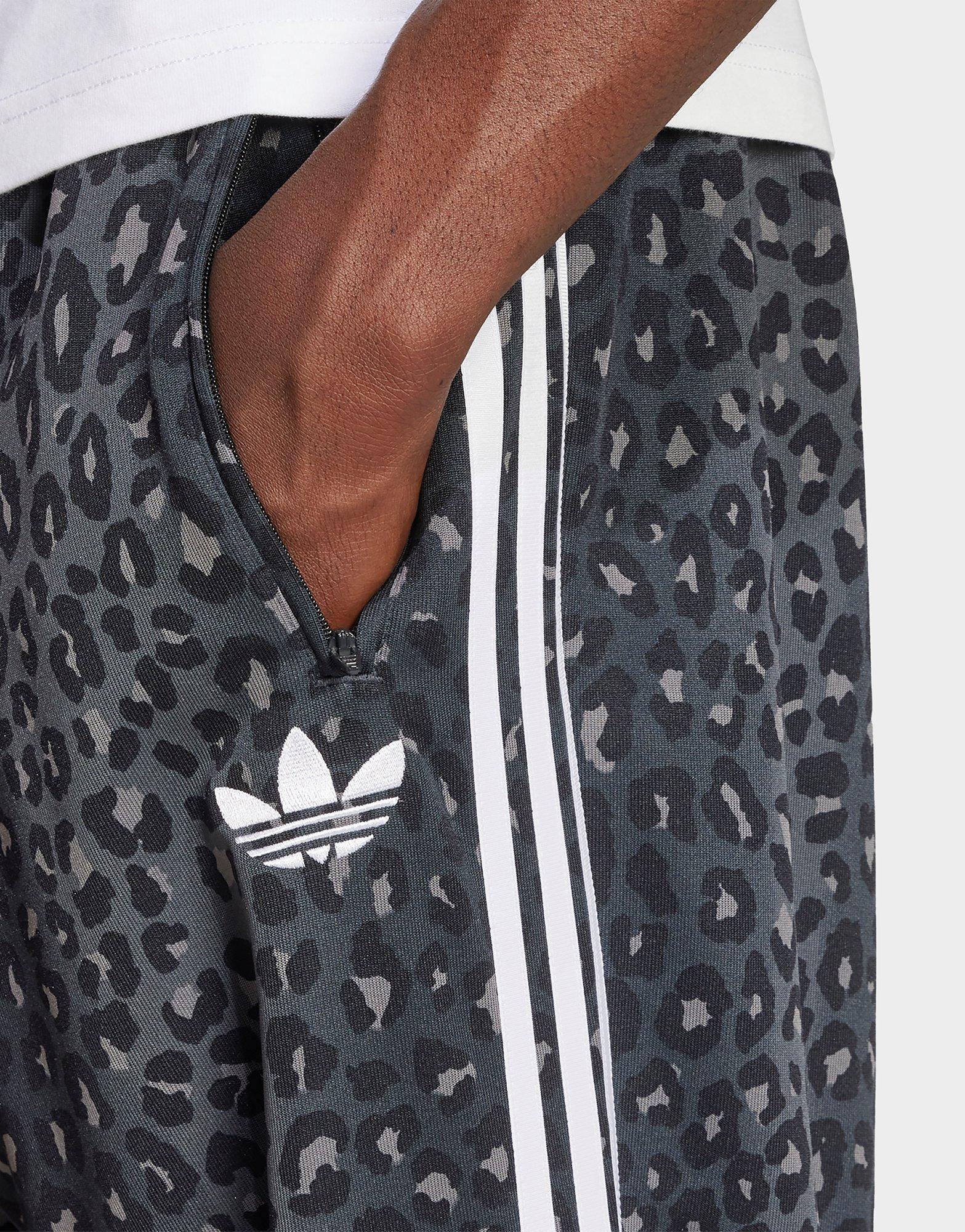 adidas Pantalon de survêtement ample léopard Firebird