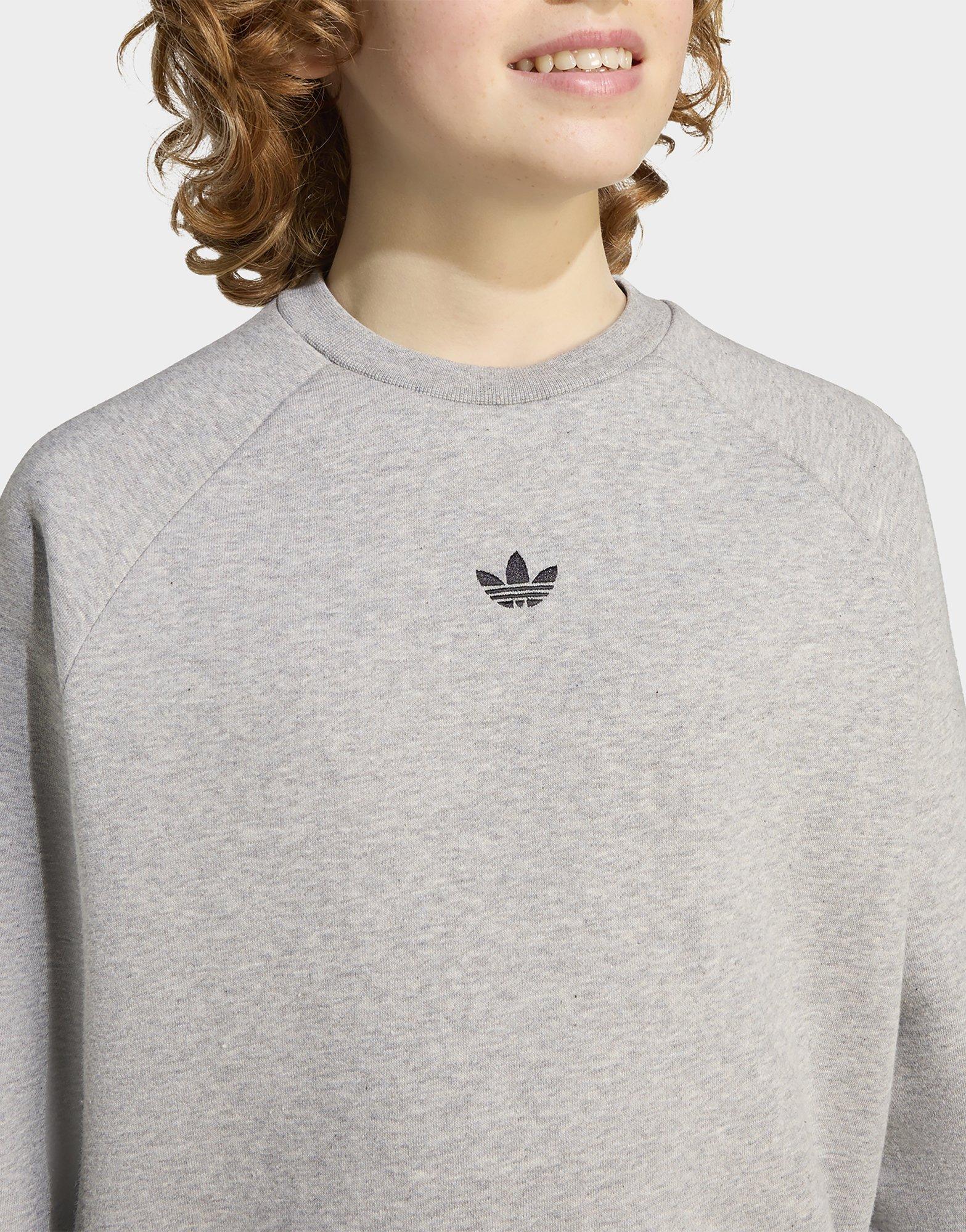 adidas Suéter suelto de cuello redondo