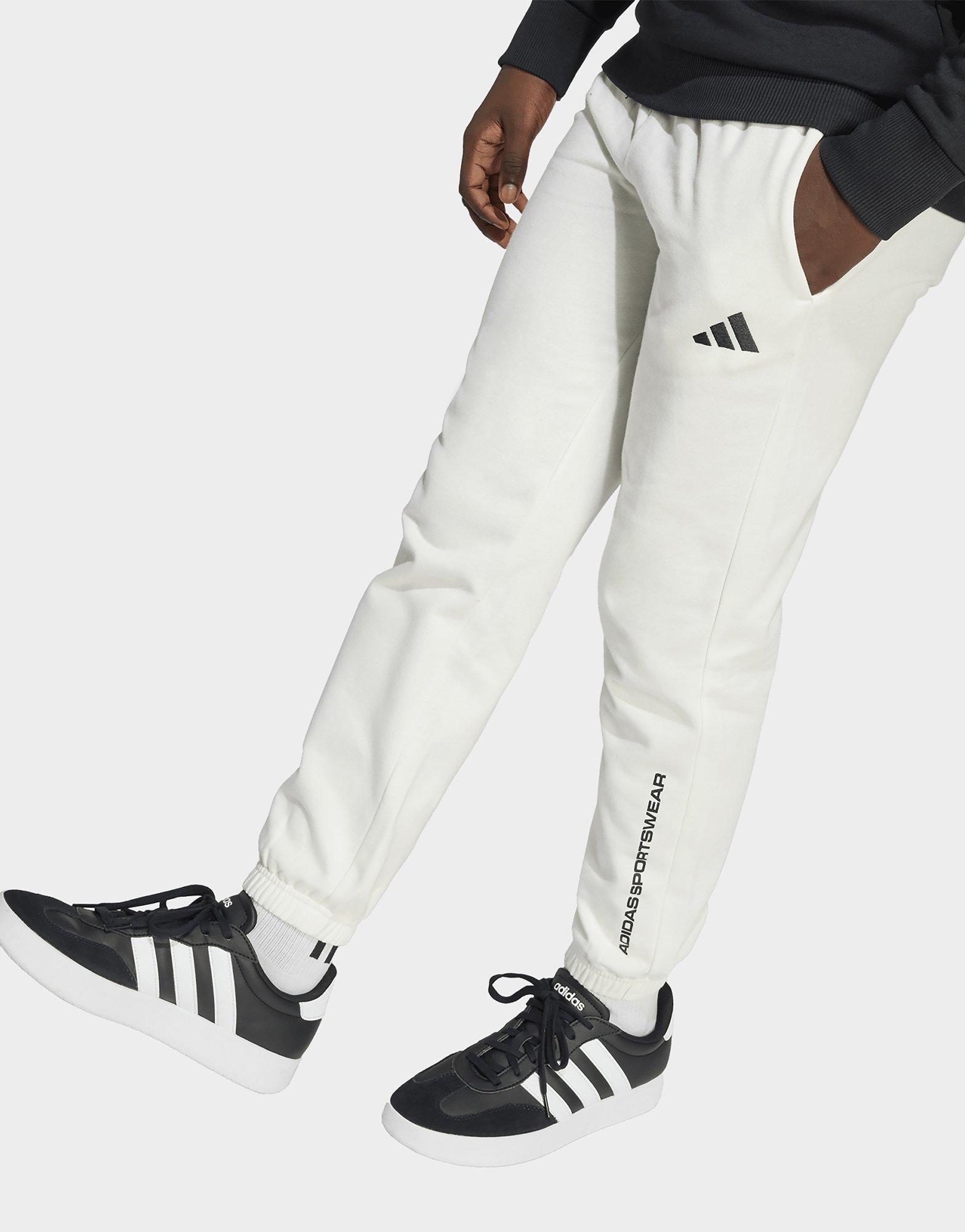 adidas Pantalón de felpa con eslogan adidas