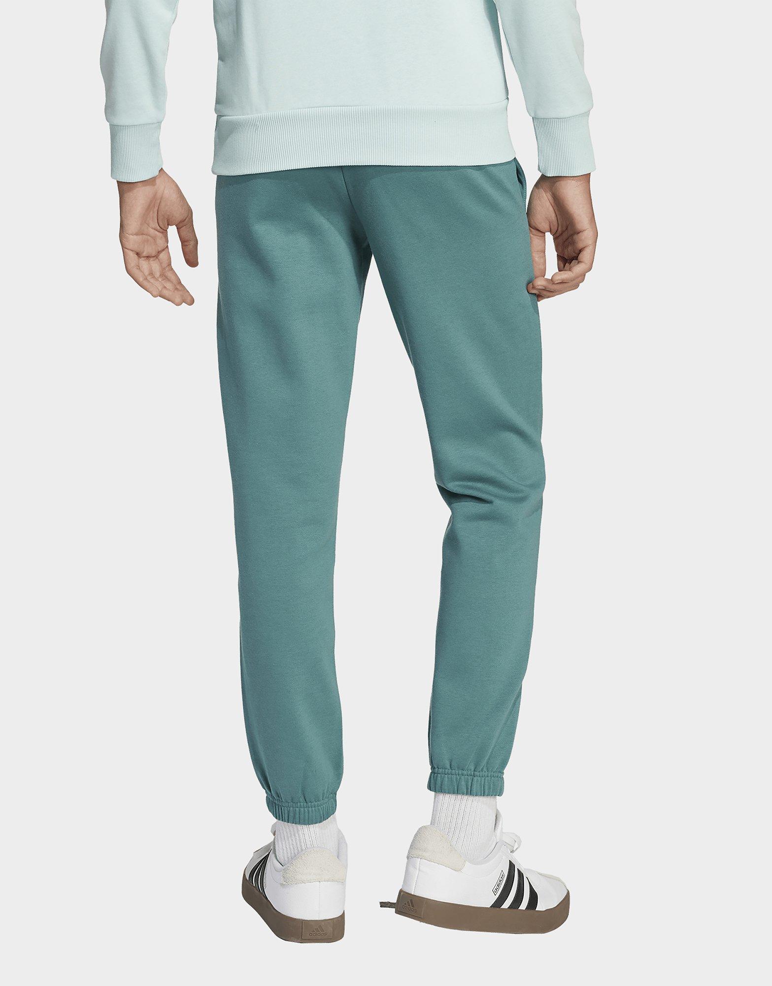 adidas Pantalón de felpa con eslogan adidas