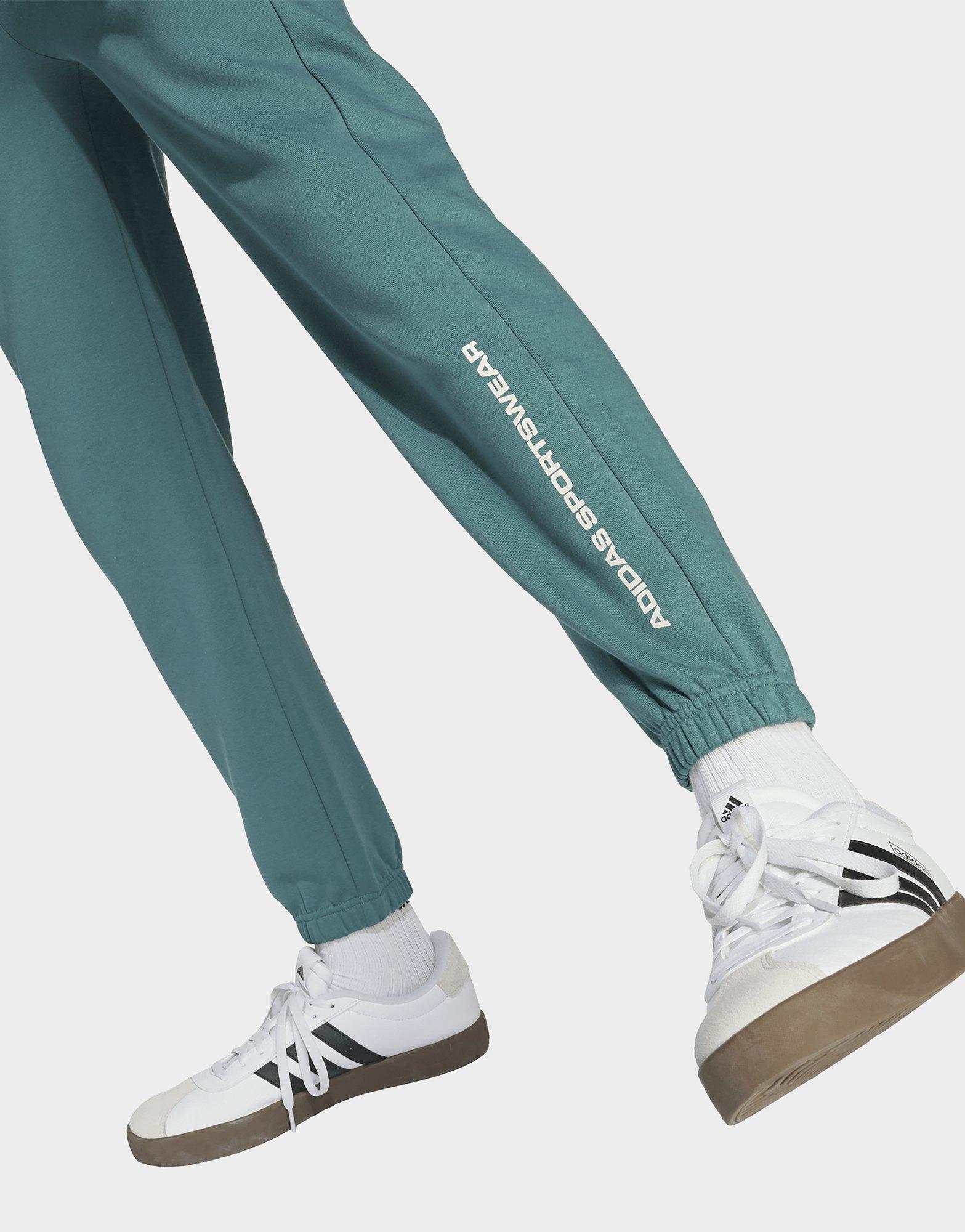 adidas Pantalón de felpa con eslogan adidas