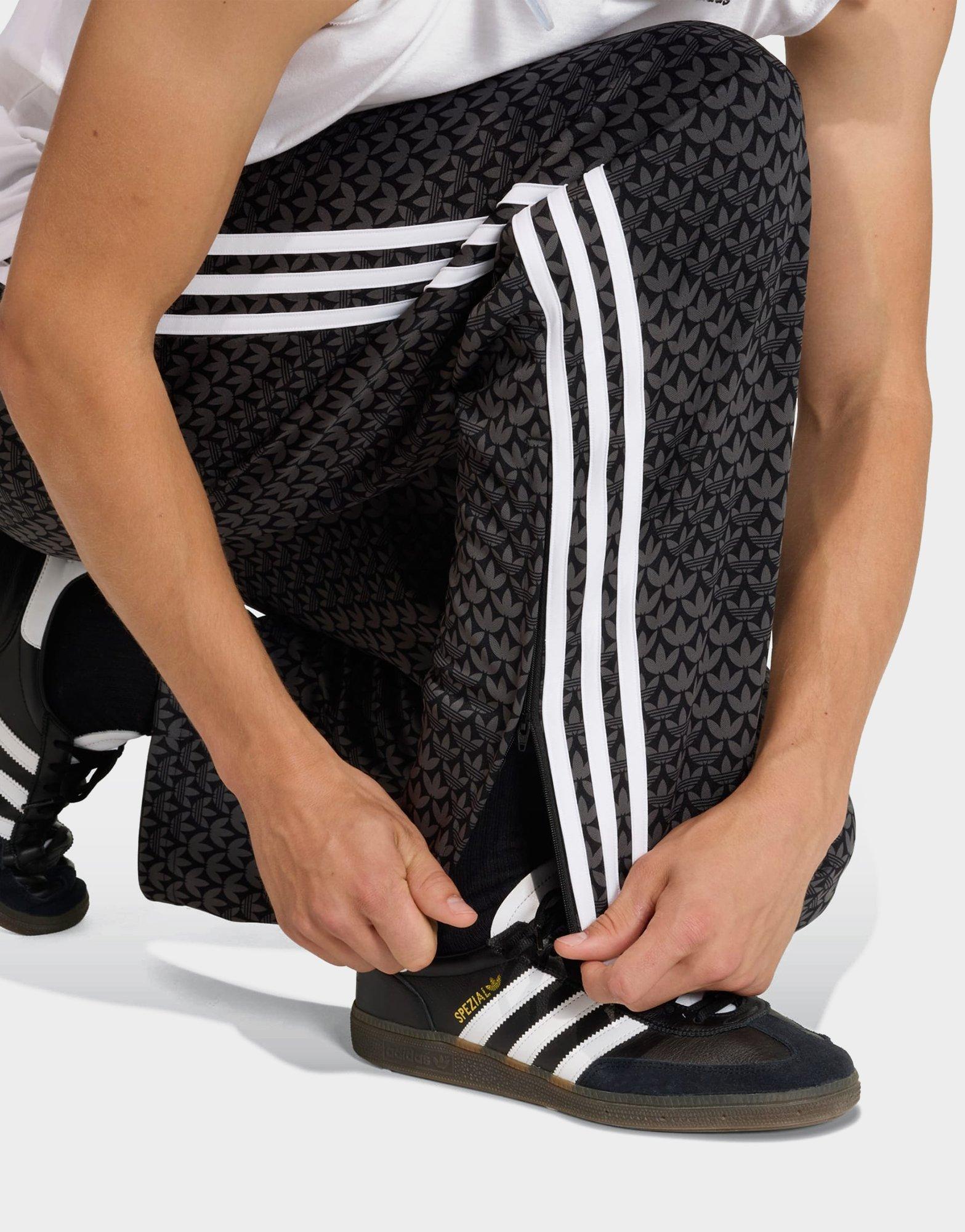 adidas PANTALÓN DE CHÁNDAL FIREBIRD LOOSE MONOGRAM