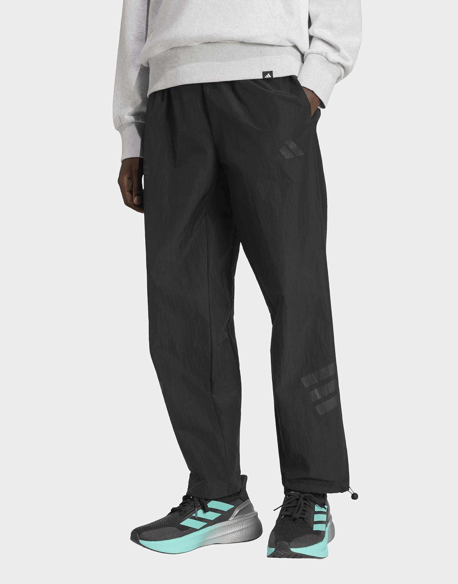 adidas PANTALONI MERCEDES - AMG PETRONAS FORMULA 1 TEAM NIGHT WOVEN