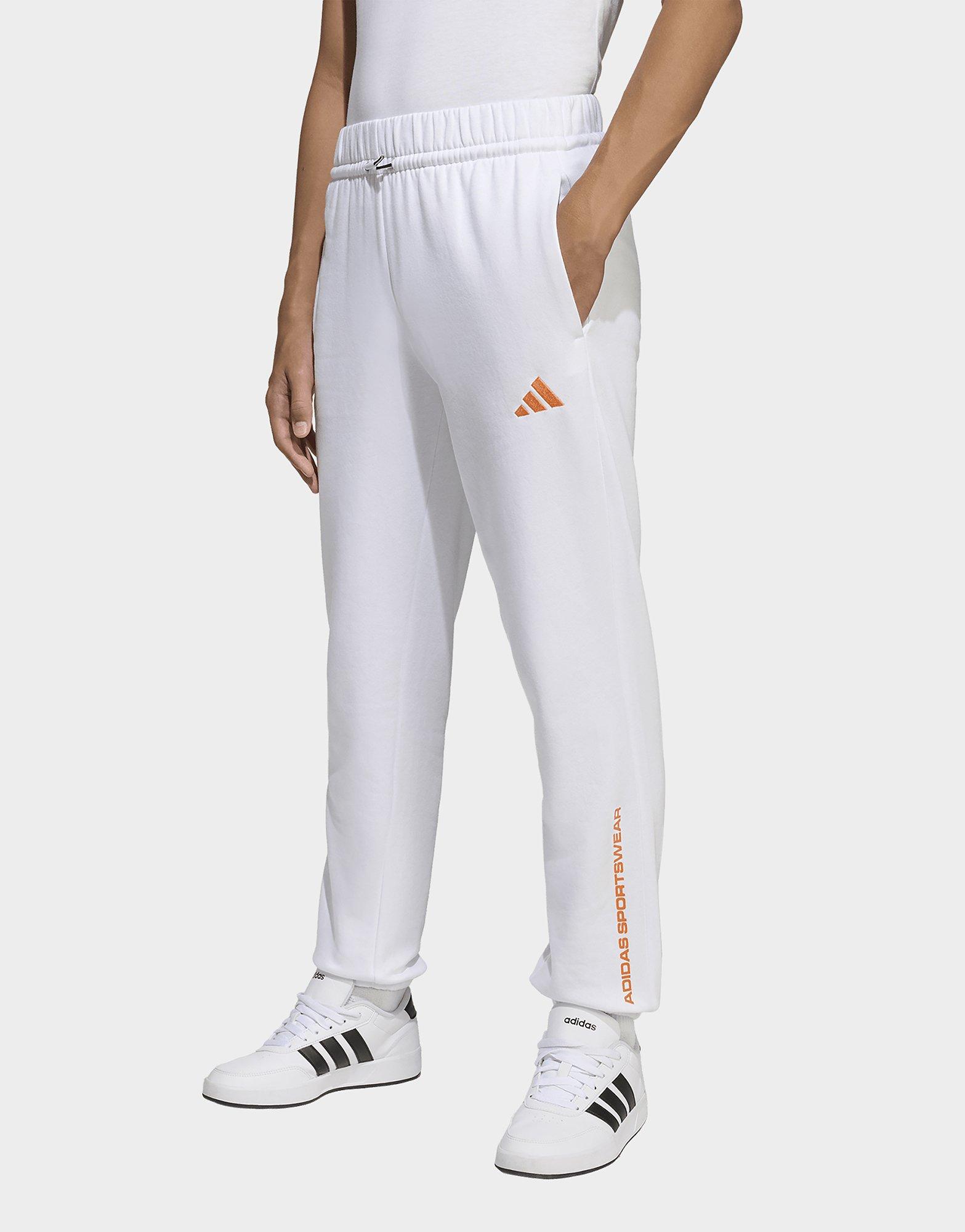 adidas Pantaloni in tessuto felpato adidas