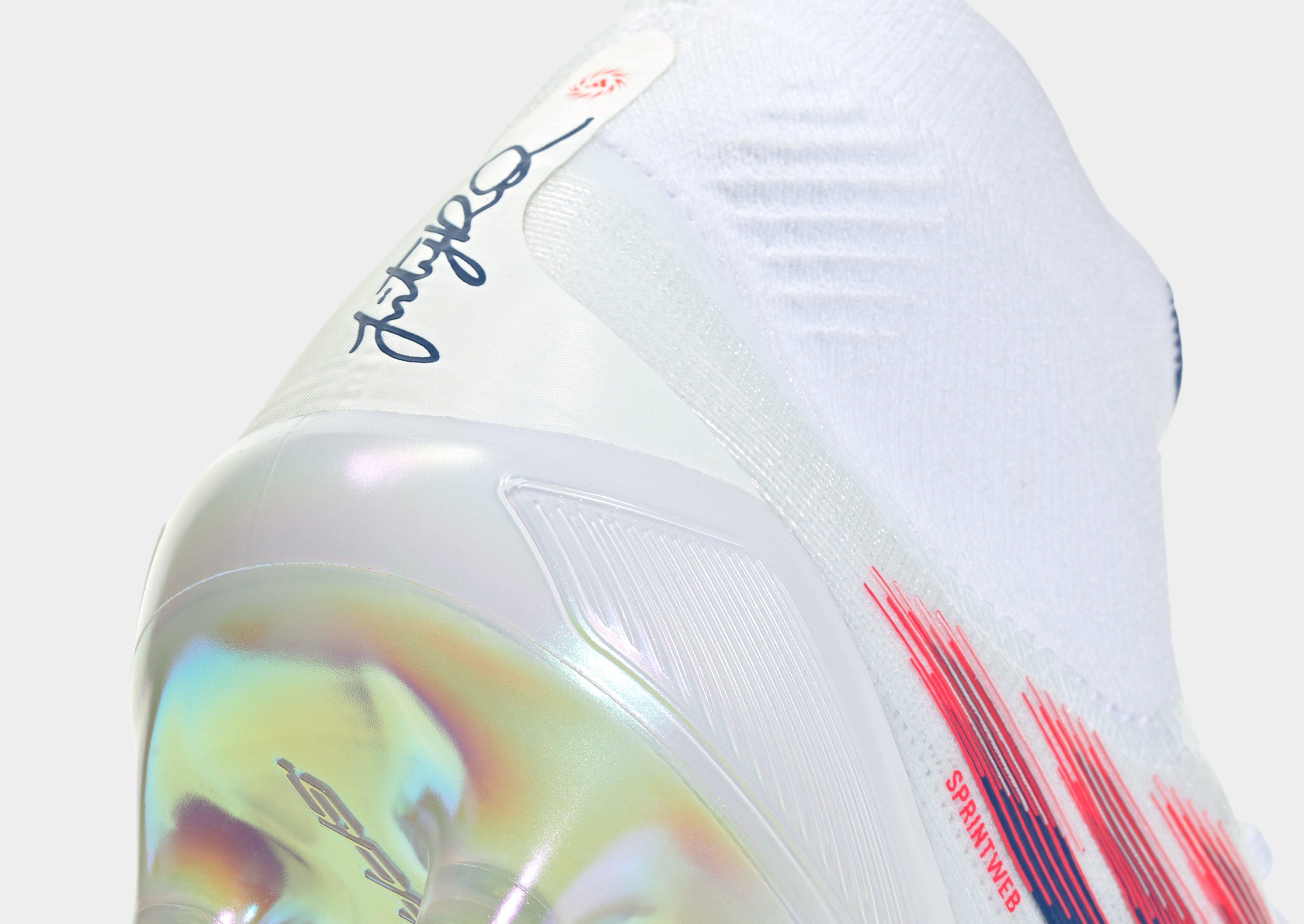 adidas Bota de fútbol F50 SPARKFUSION ELITE Womens de media caña para césped natural seco o artificial