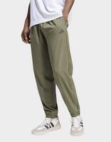 adidas Pantaloni Essentials Stanford Lite IN tessuto intrecciato con gamba affusolata con orli con piccolo logo