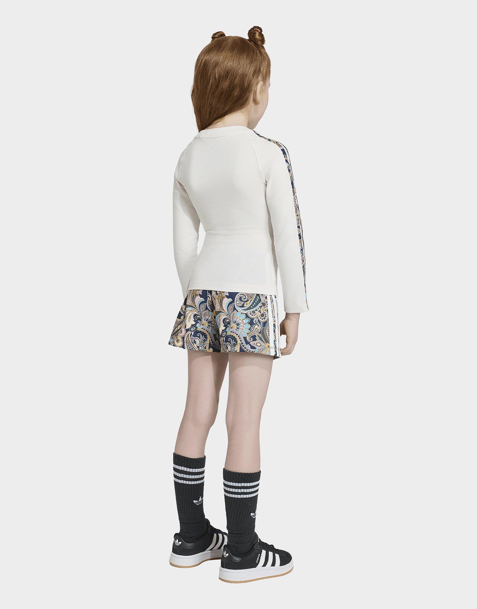adidas Conjunto de camiseta de manga larga entallada con las 3 bandas y falda pantalón cruzada Liberty London