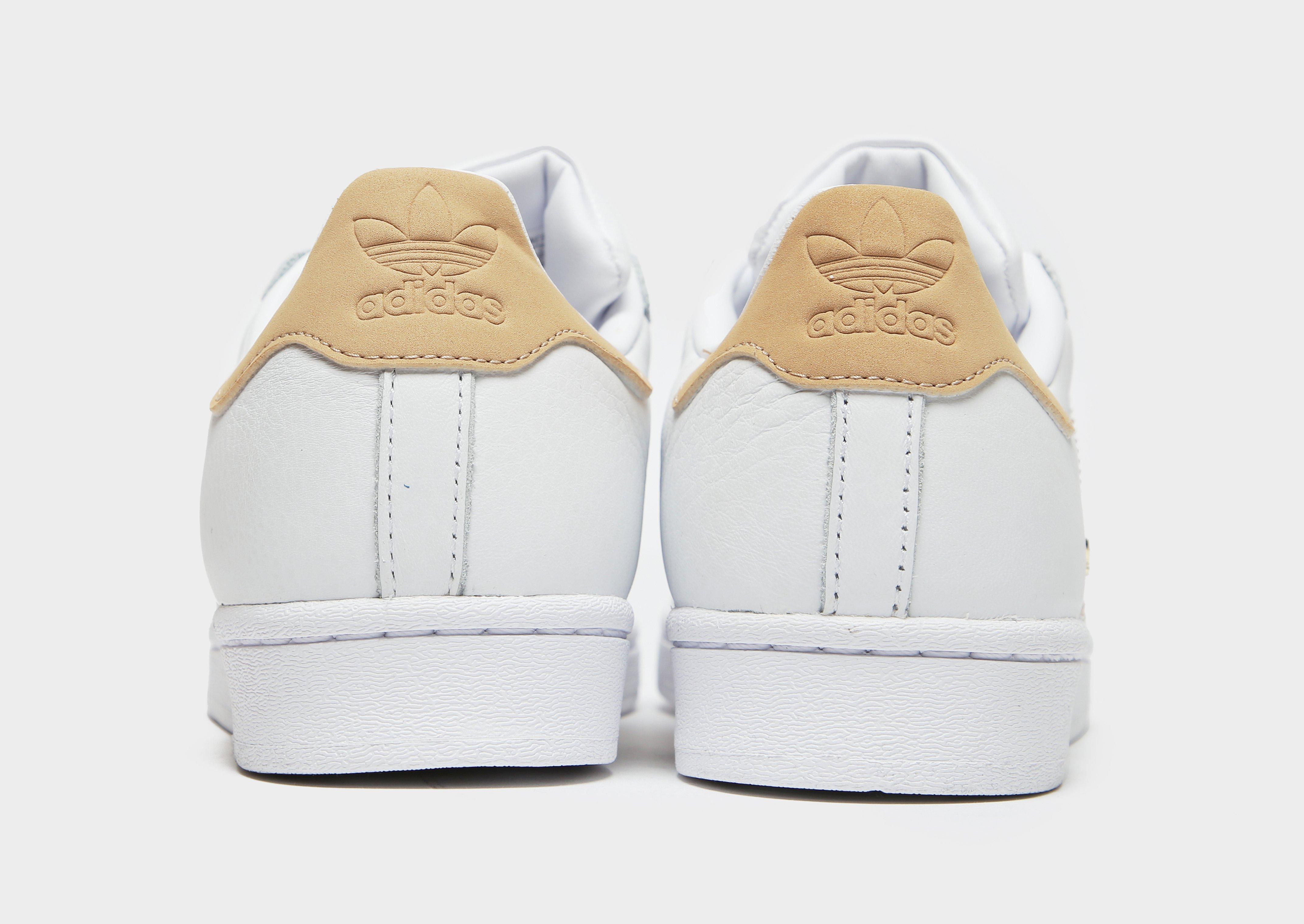 all white adidas superstar womens