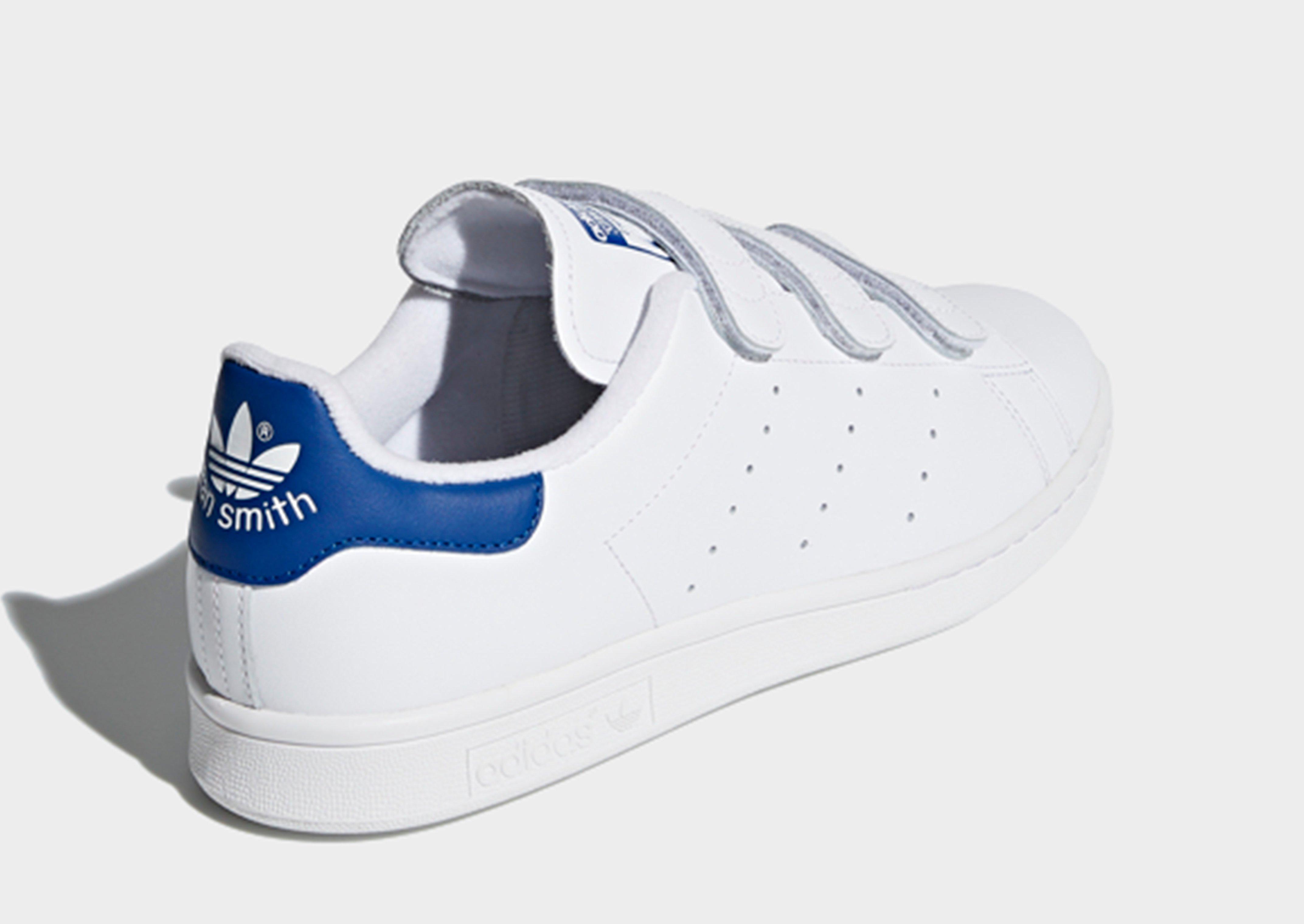 adidas originals stan smith velcro sneakers in white and blue