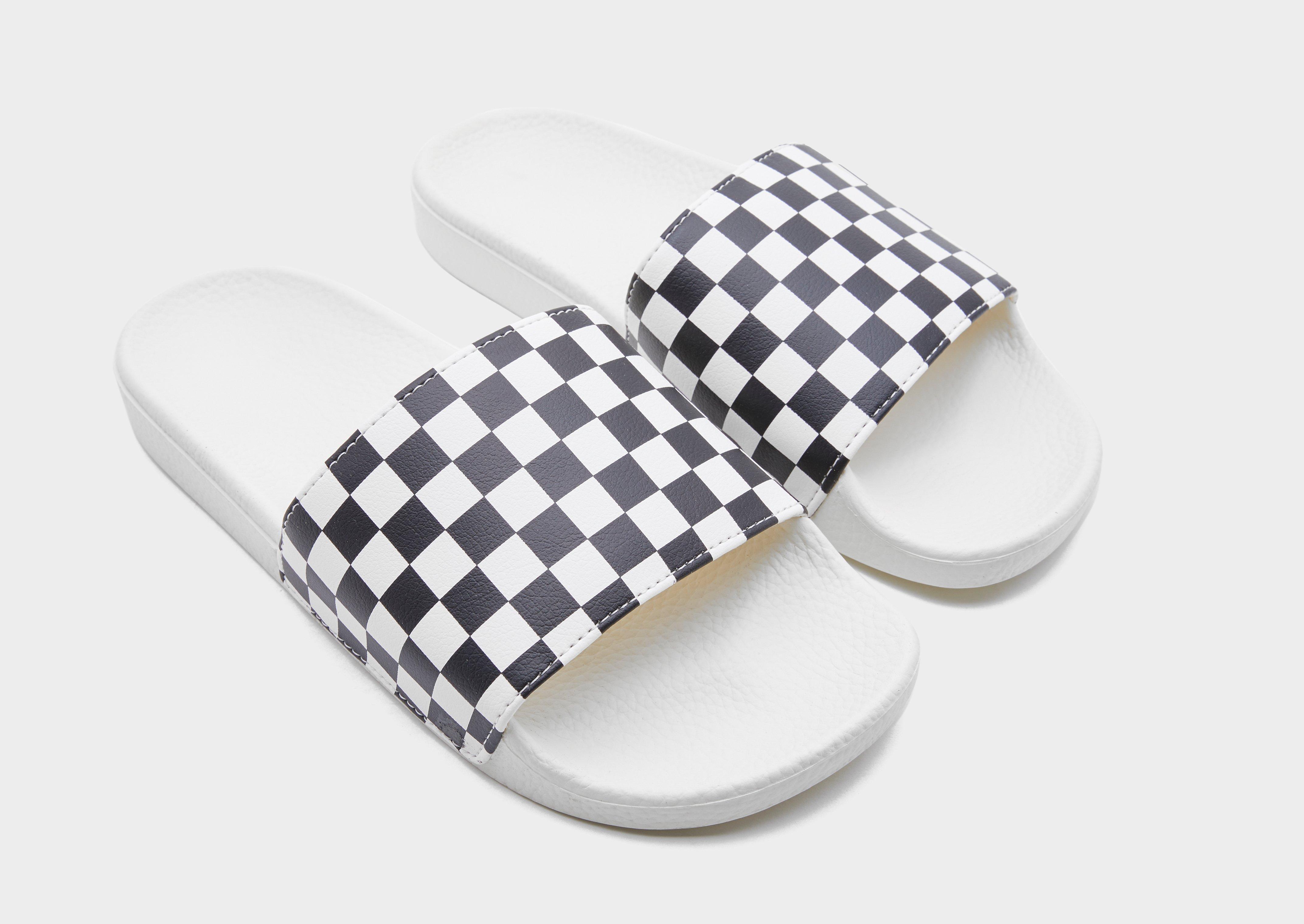 black and white checkered vans slides