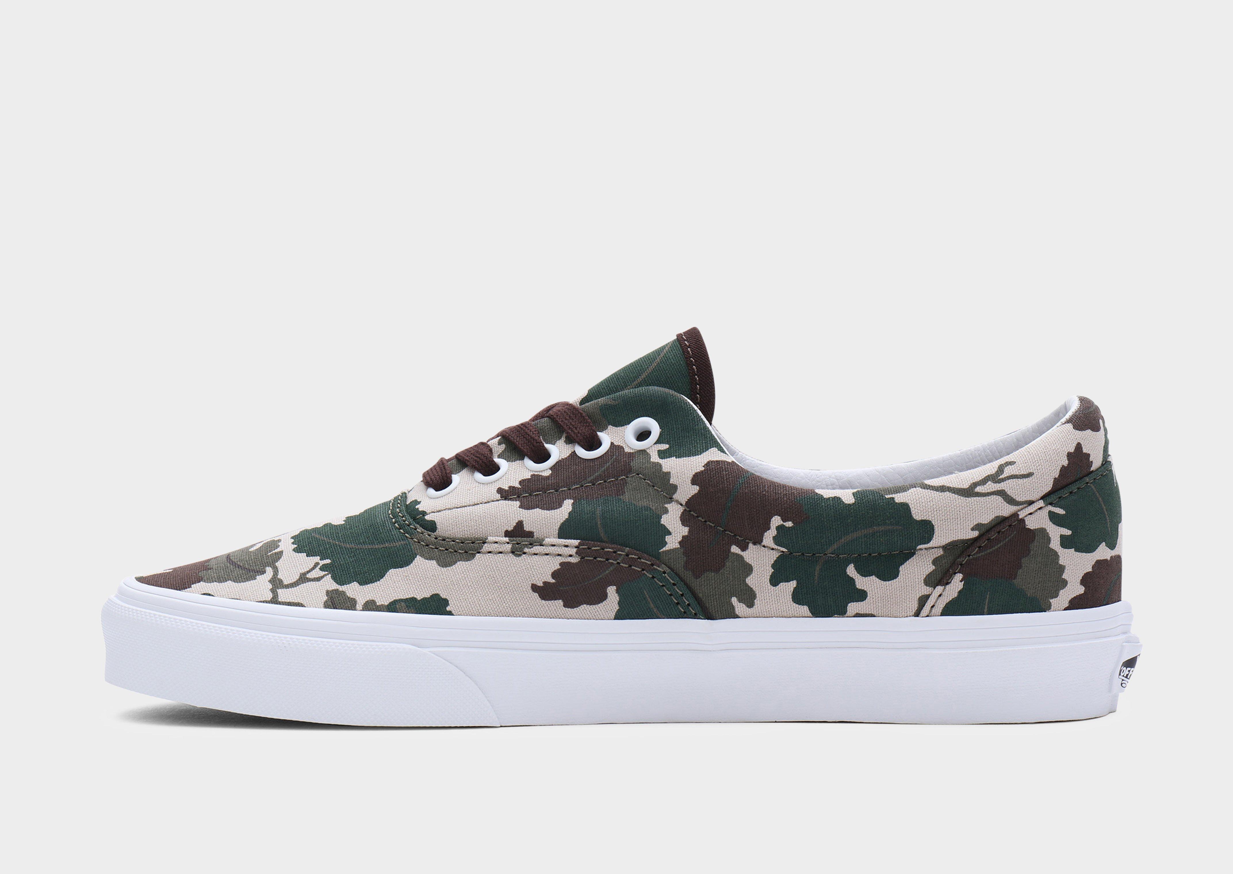 Camo vans sale on feet