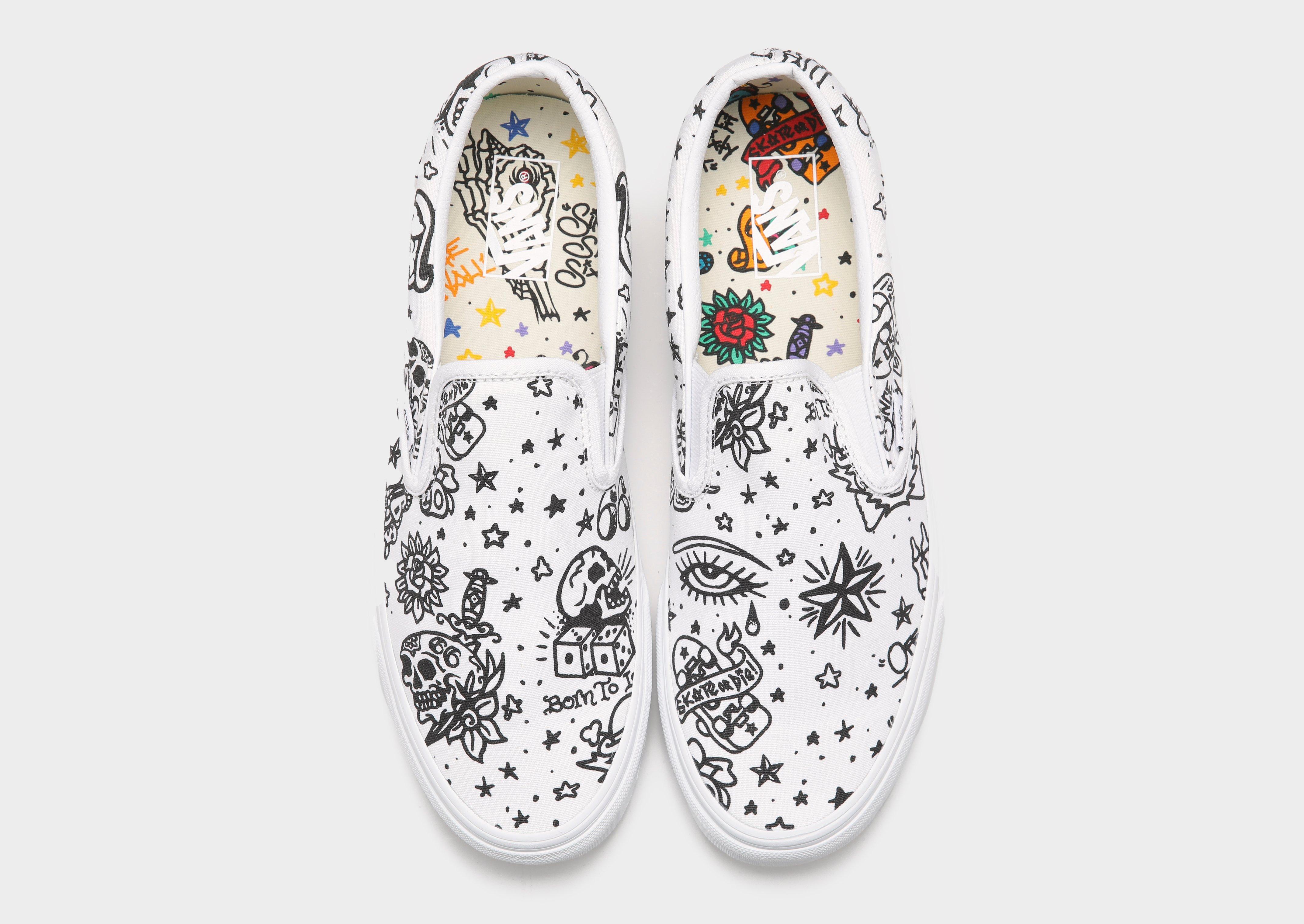 junior white slip on vans