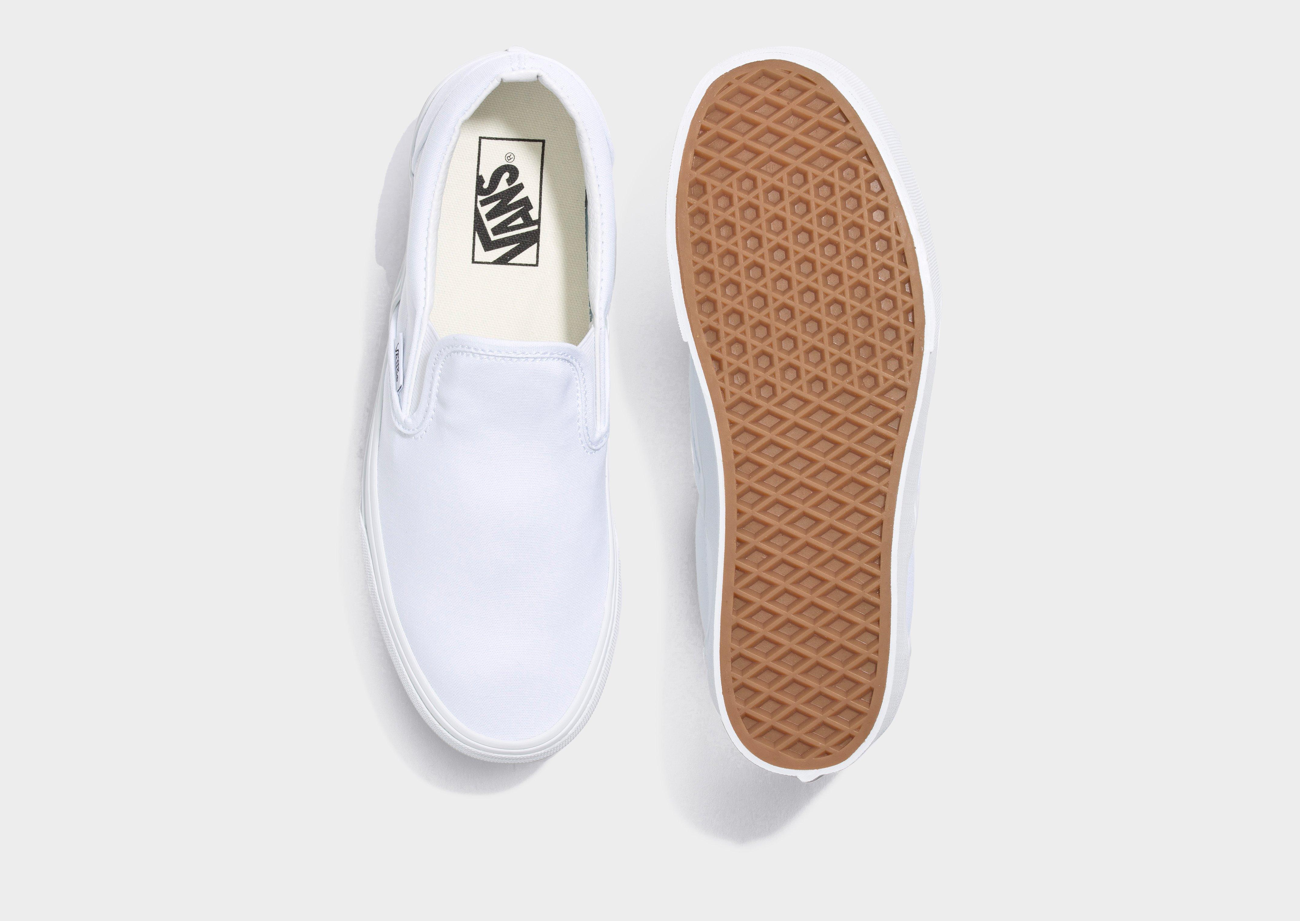 Plain white vans slip ons clearance