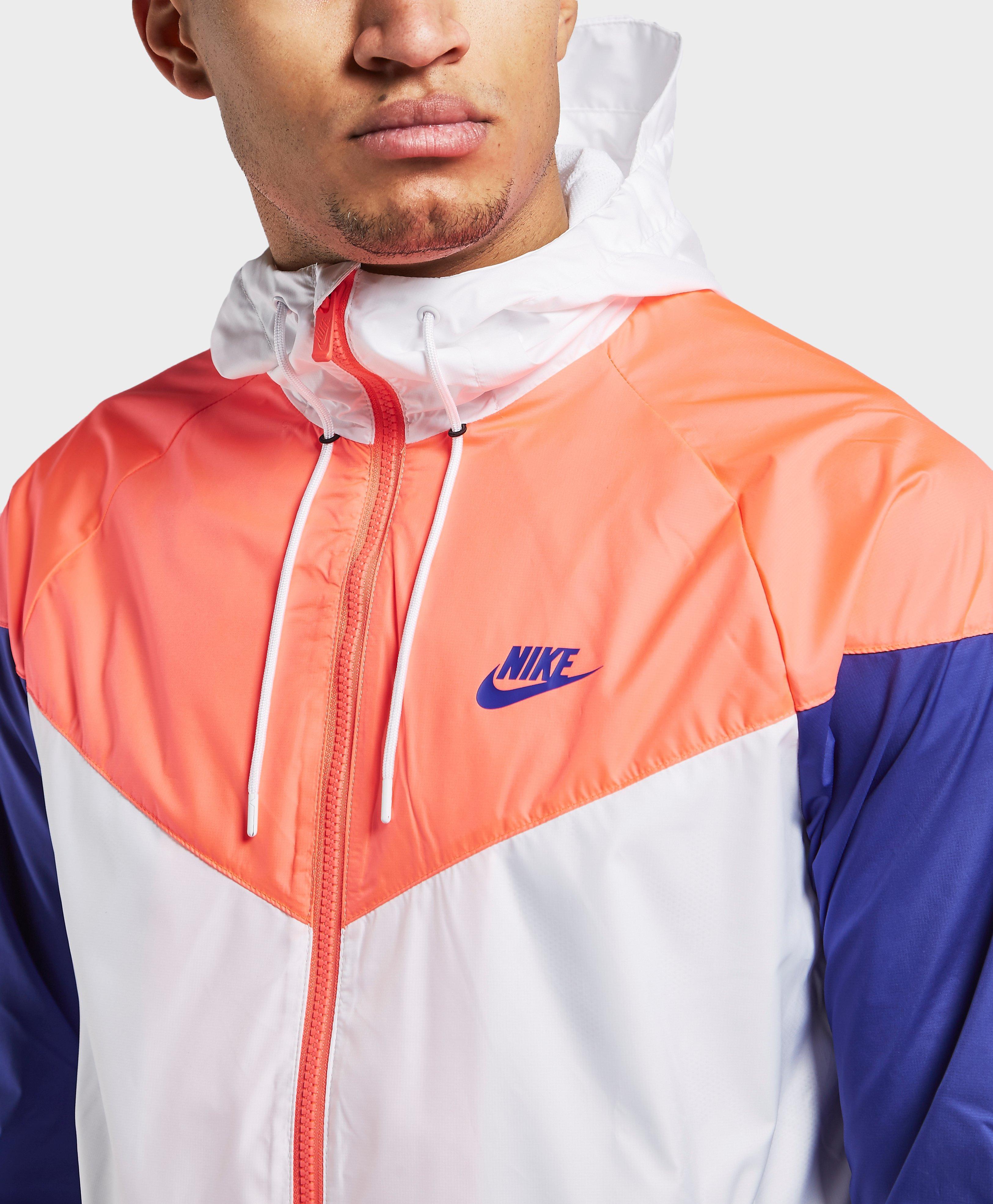orange white and blue nike windbreaker