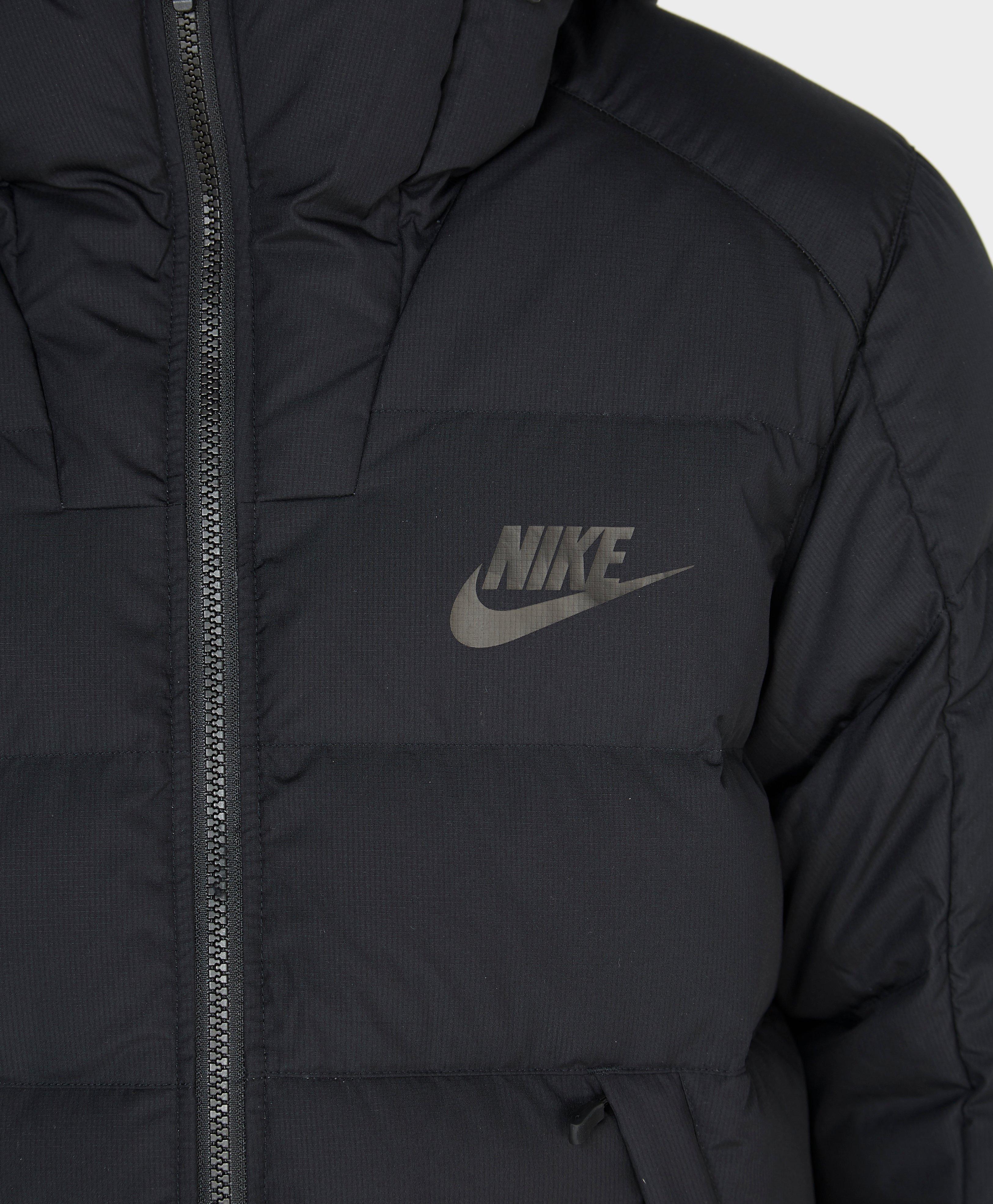 nike logo puffer jacket in black