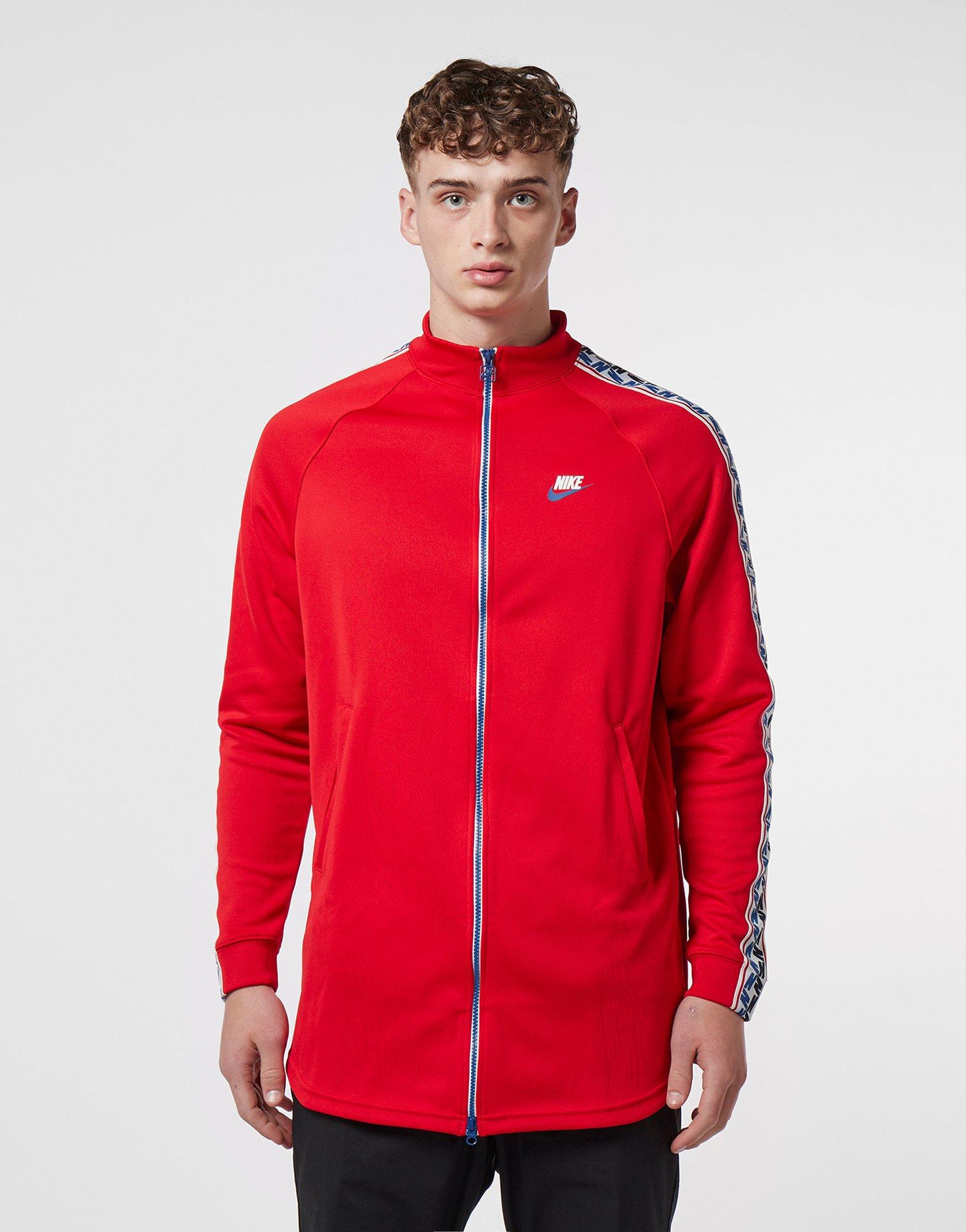 nike arch taped track top