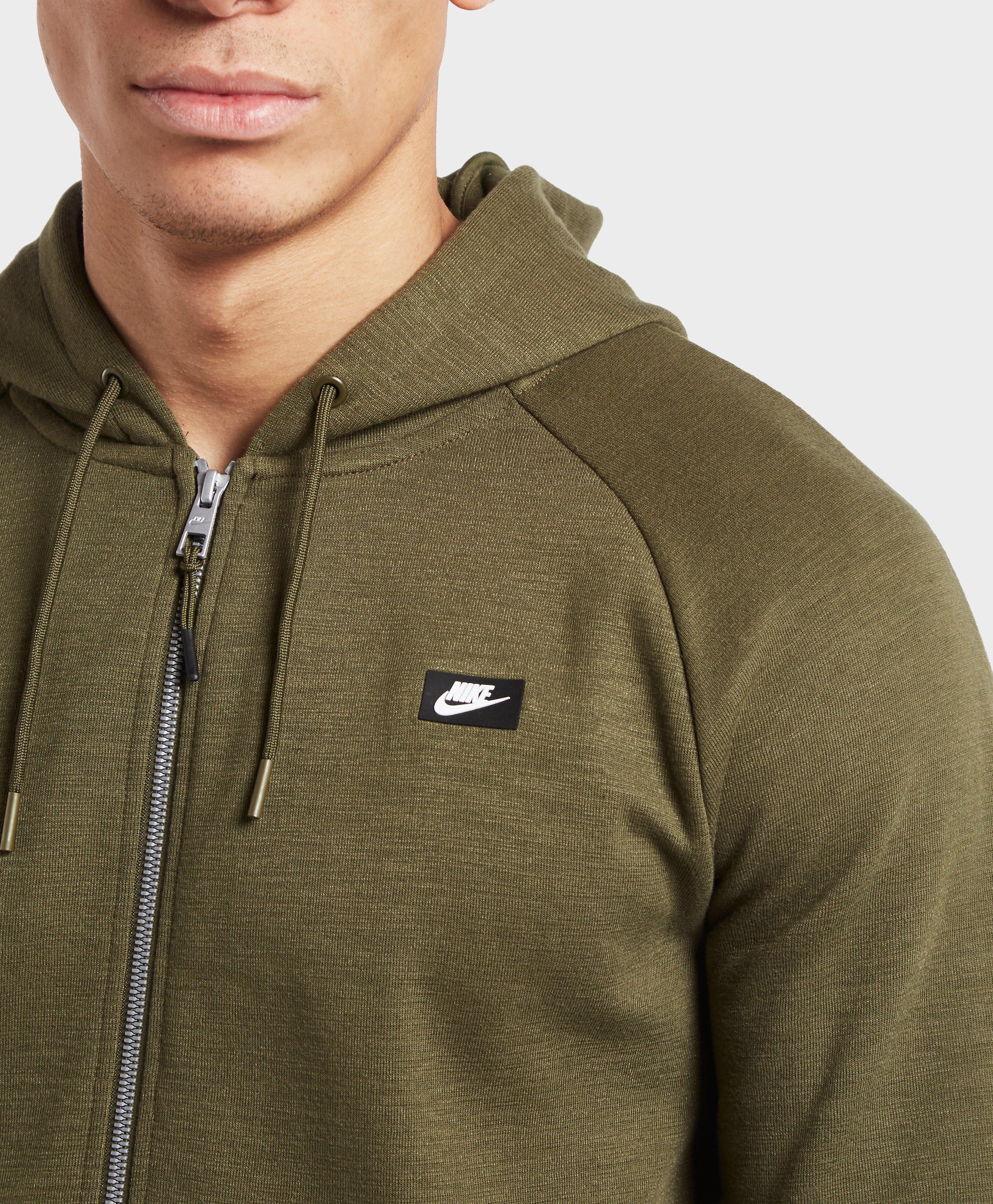 olive green nike zip up hoodie