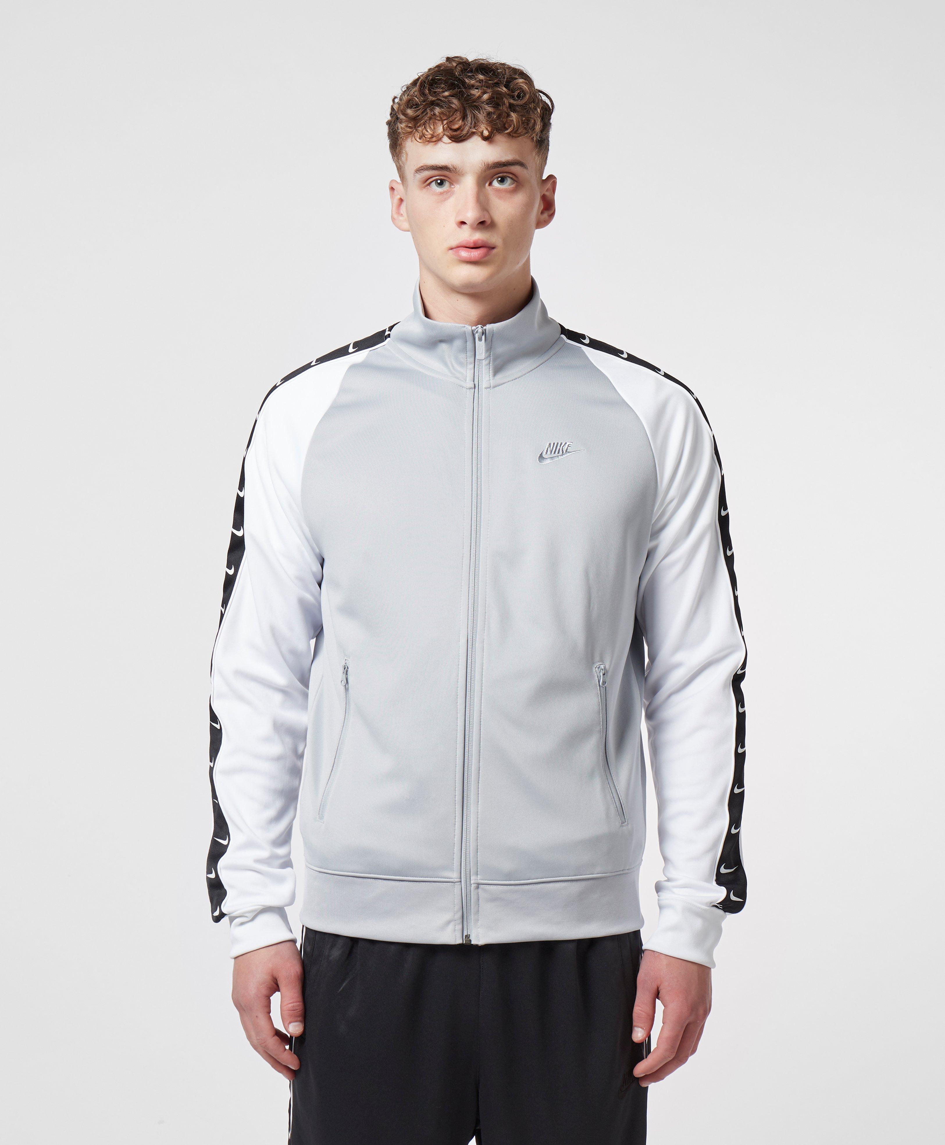 nike taped poly track top