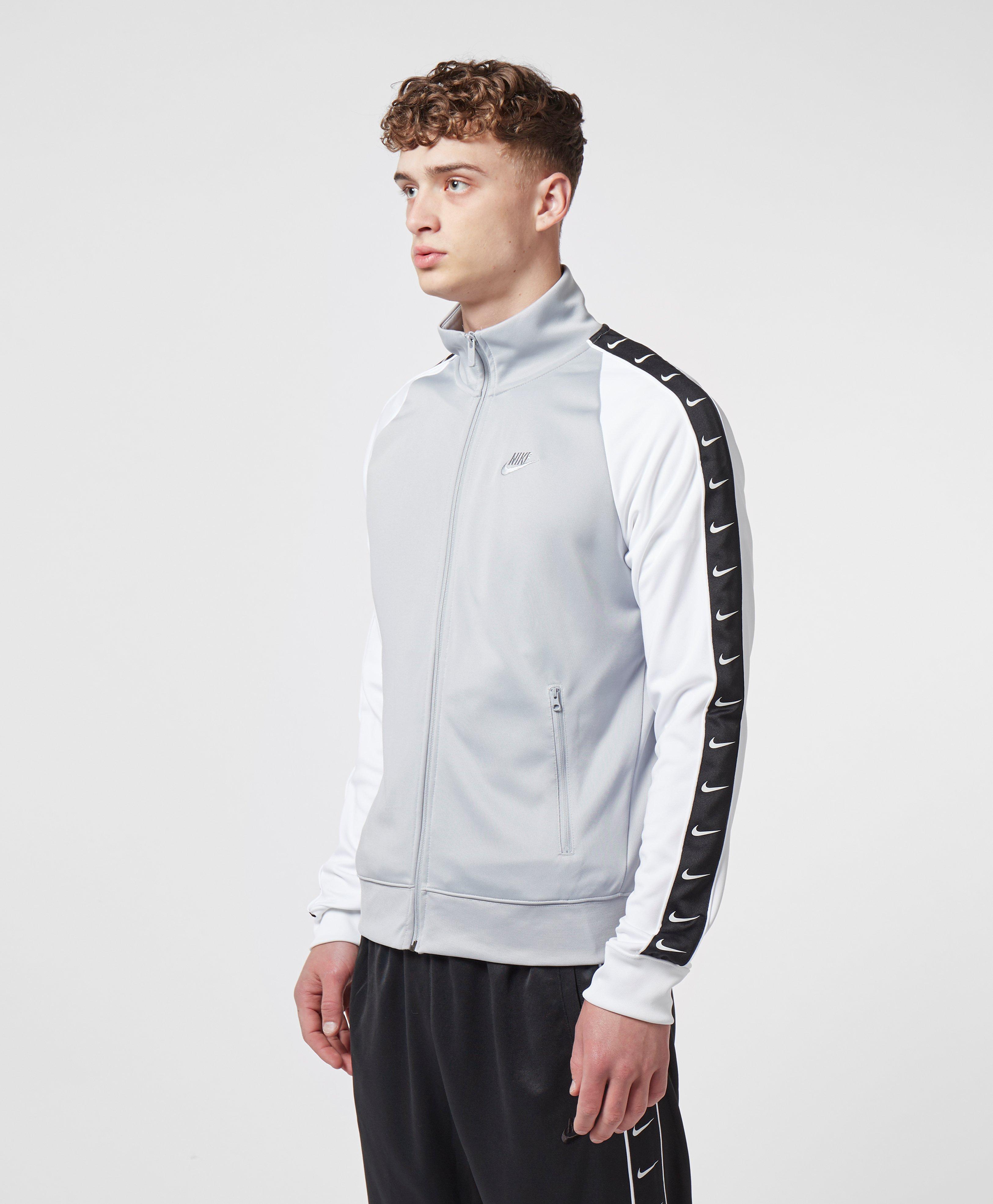 nike taped poly track top