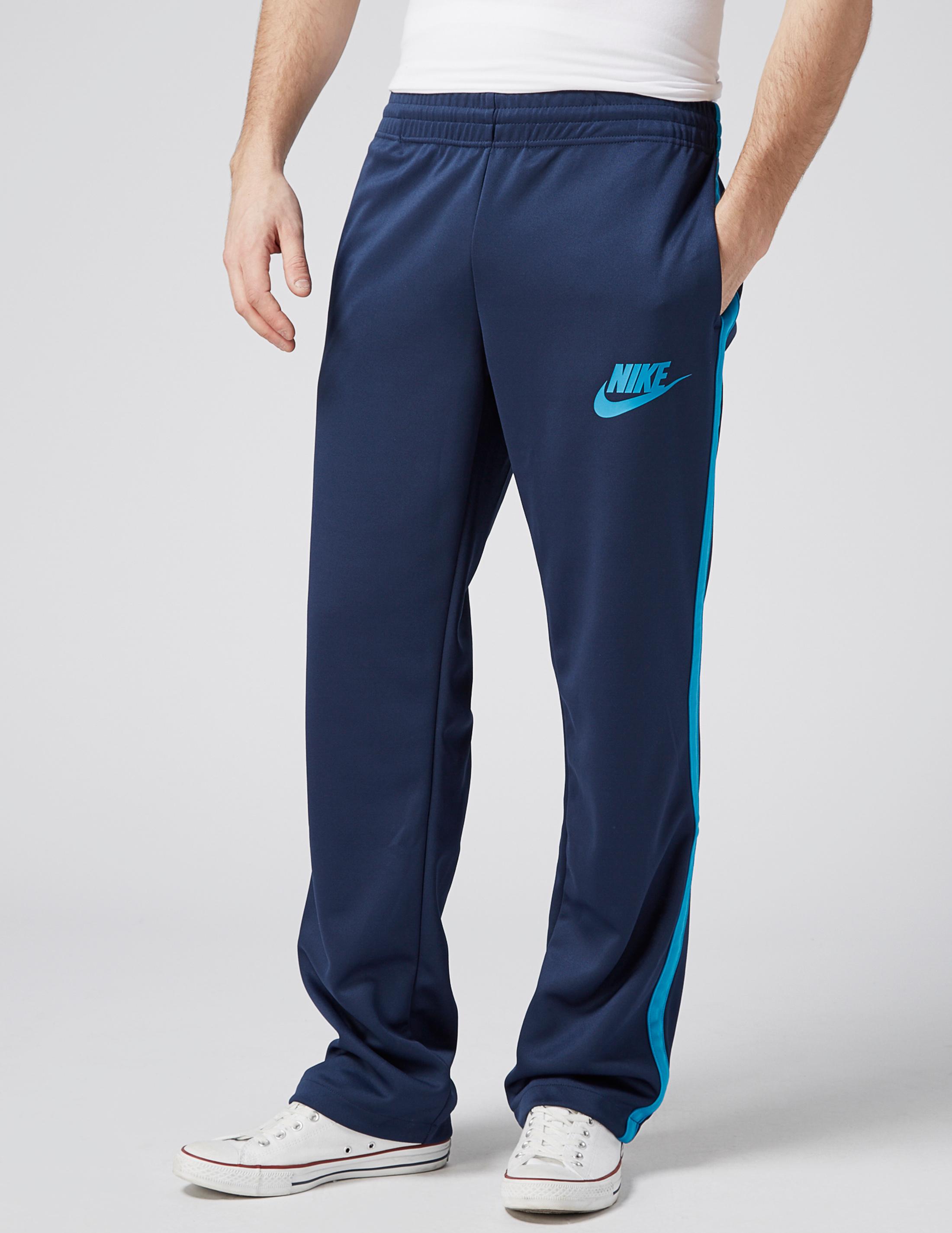 nike tribute track pants blue