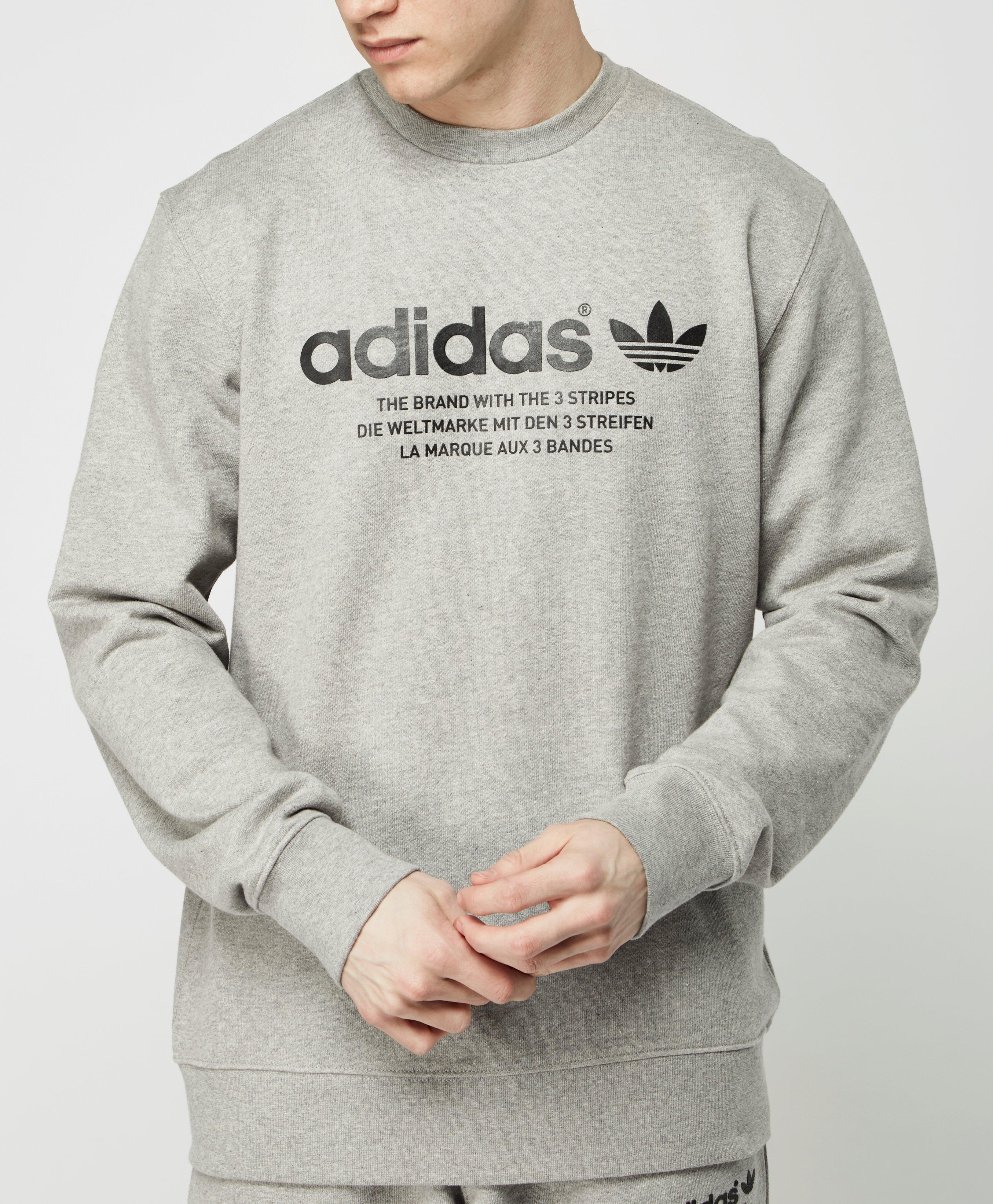 the brand with the three stripes sweatshirt