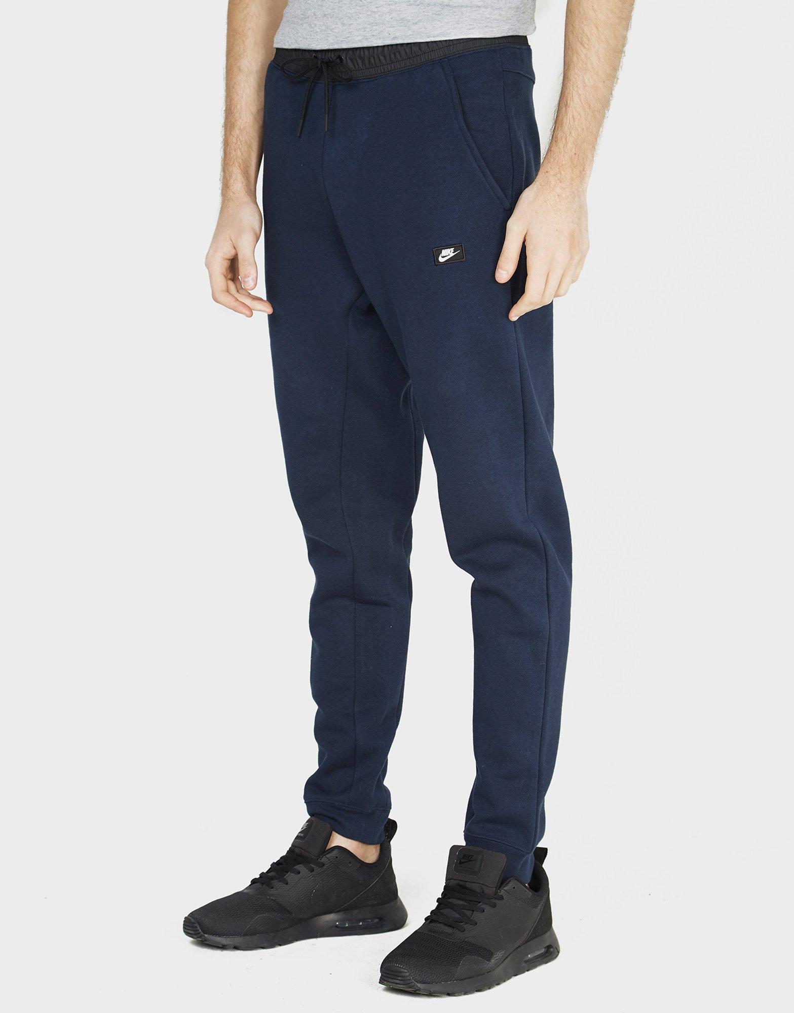 nike modern fleece pants blue