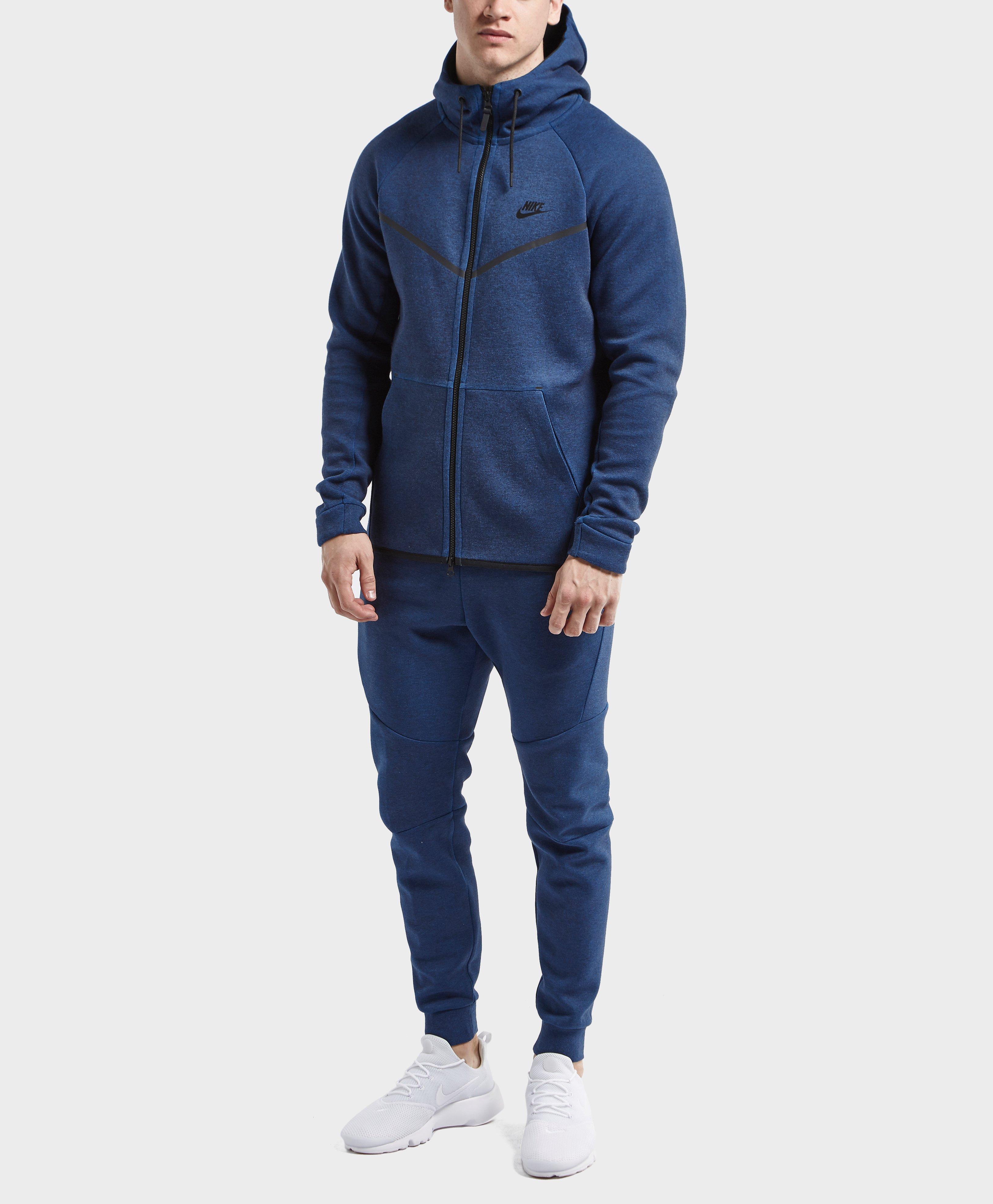 navy blue nike tech tracksuit