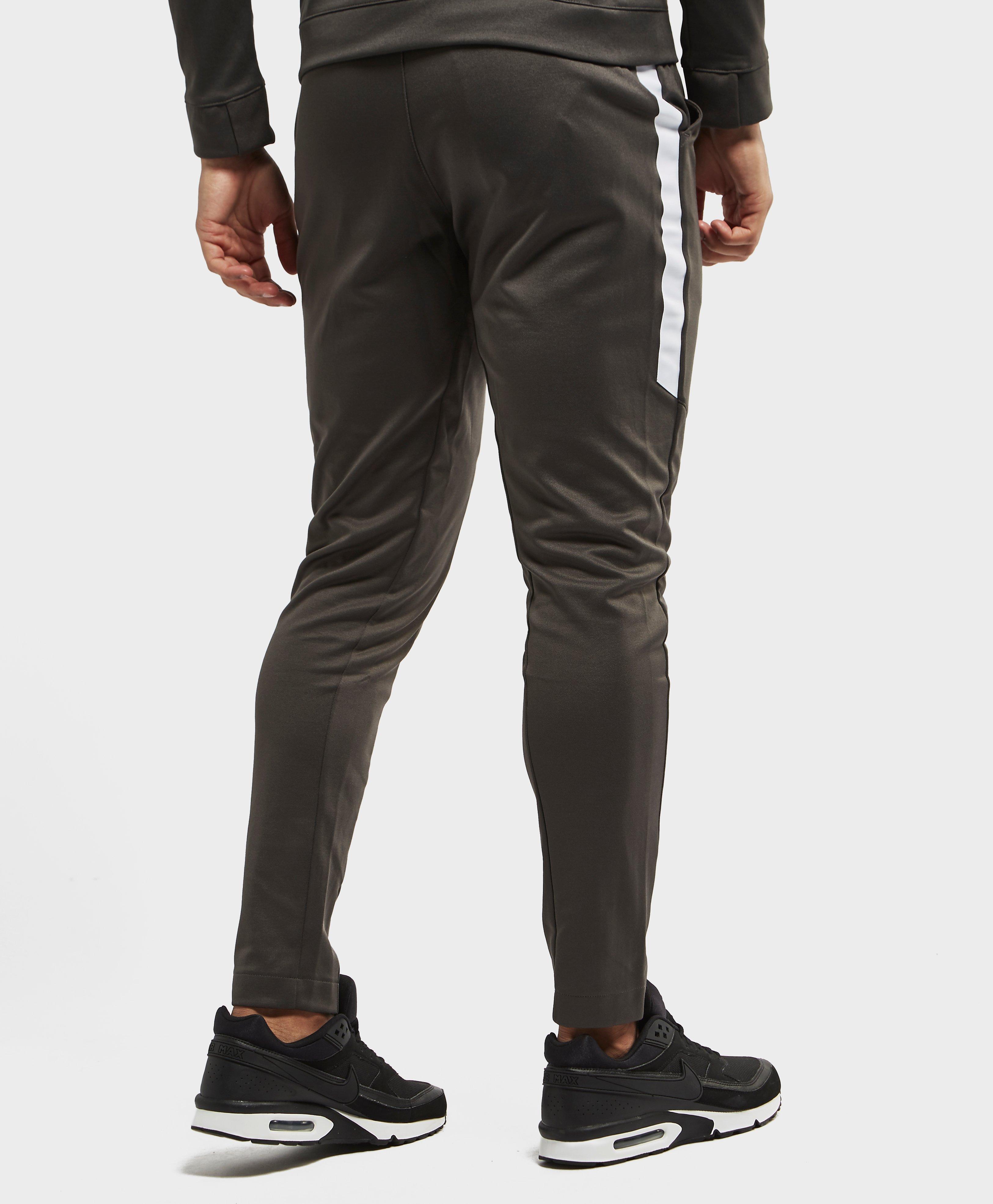 tribute track pants nike