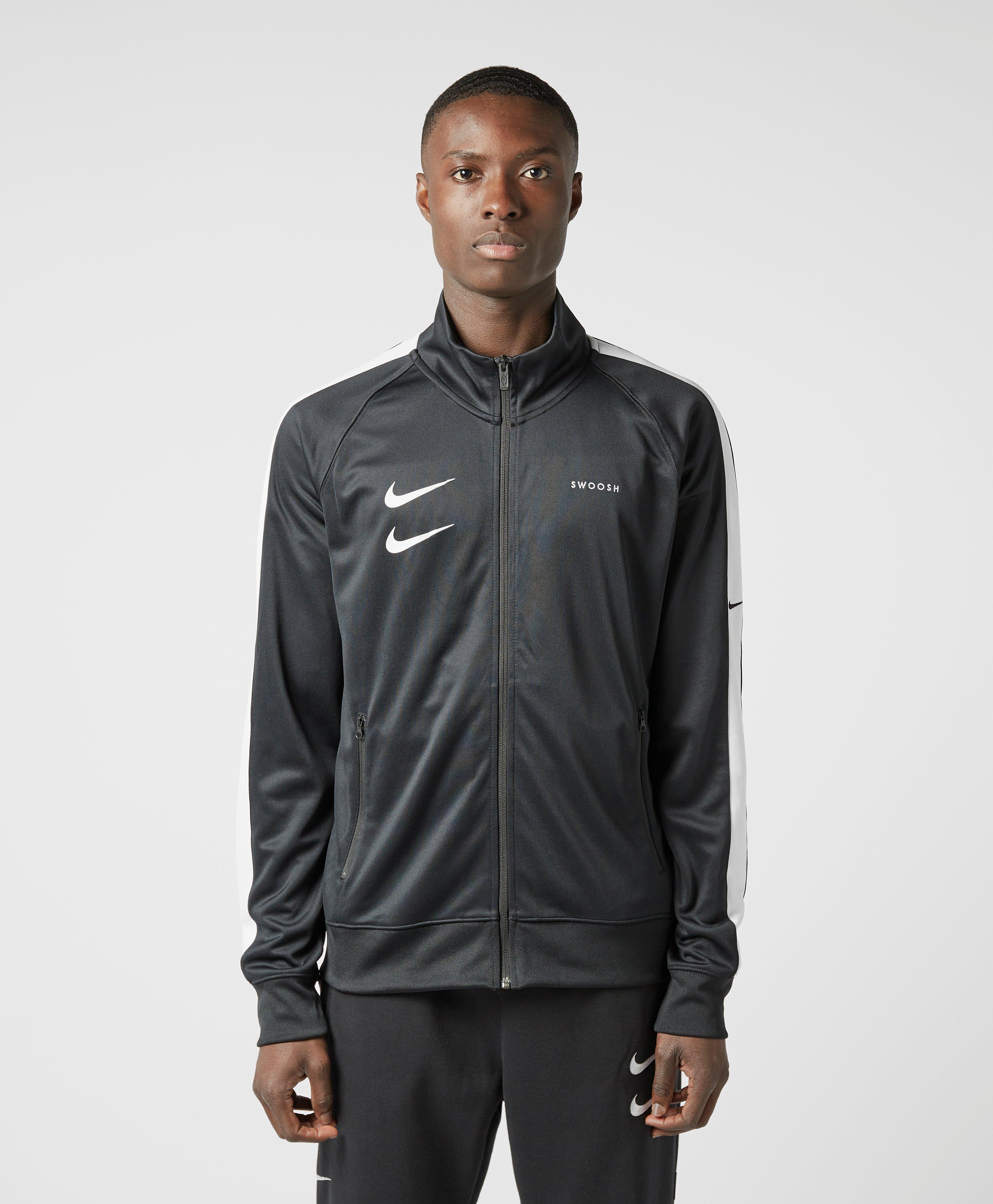 top nike swoosh