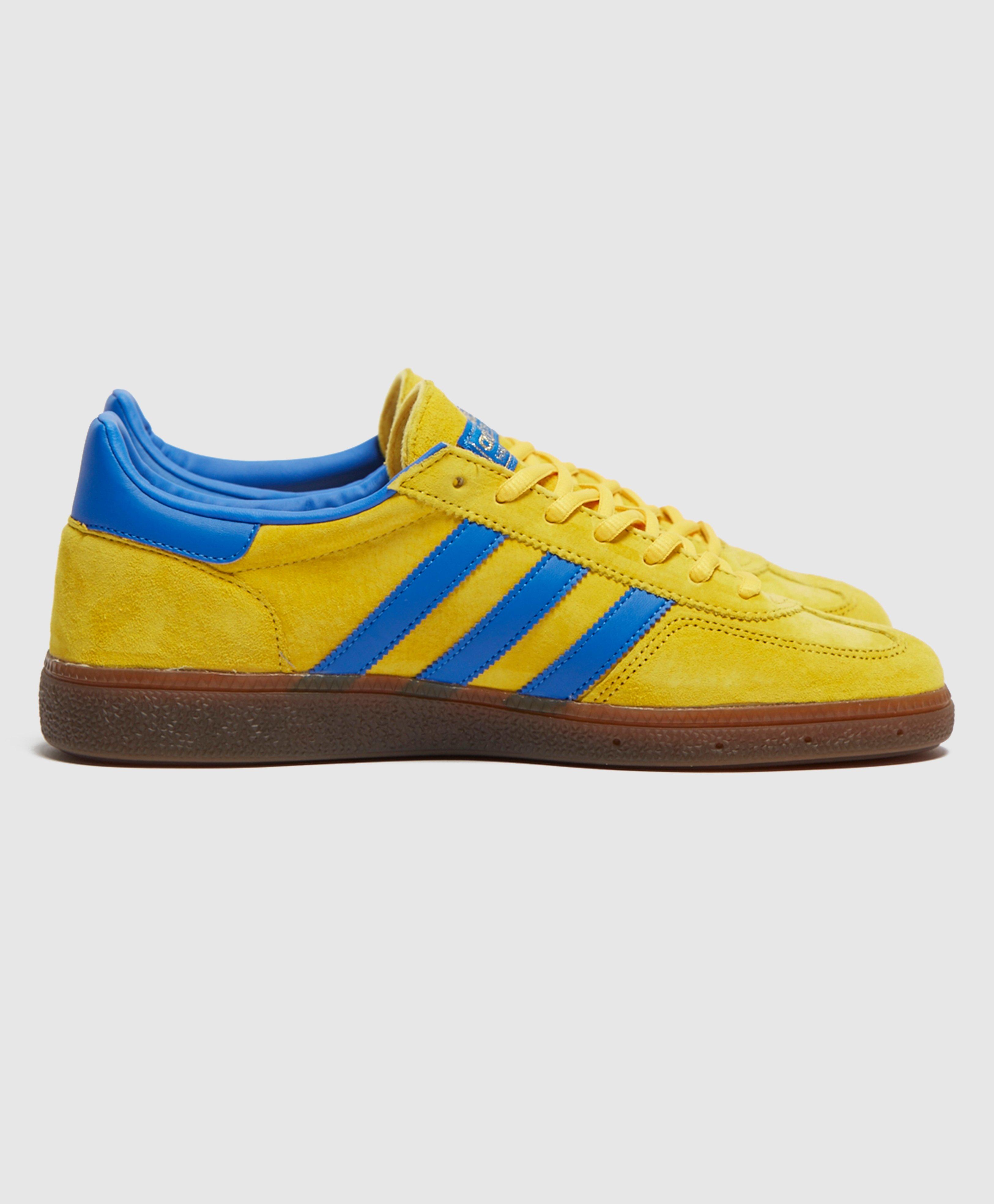 blue and yellow adidas spezial