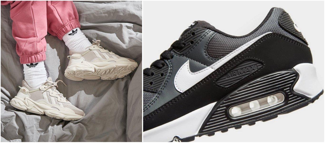 cremefärgad adidas Ozweego på person med rosa träningsbyxor och vita adidasstrumpor samt svarta Nike Air Max 90