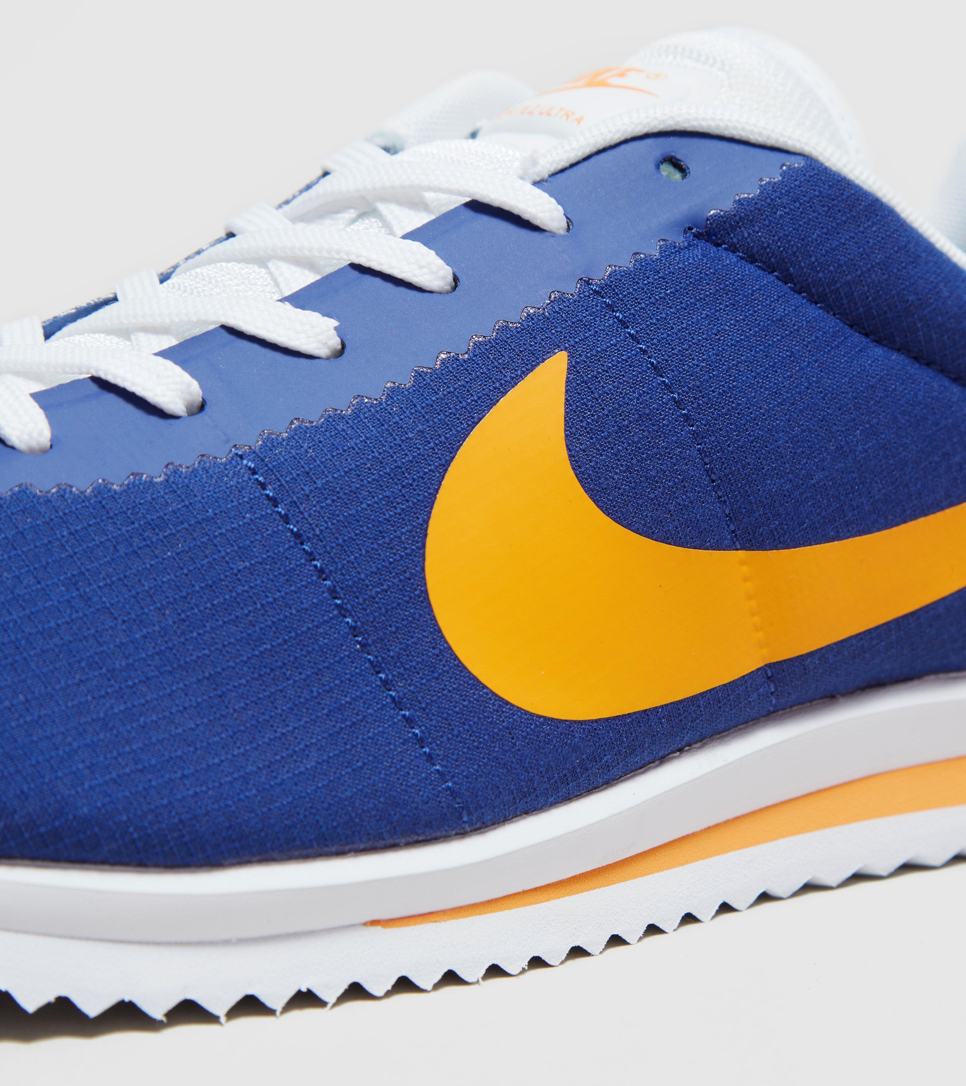 nike cortez blue and yellow