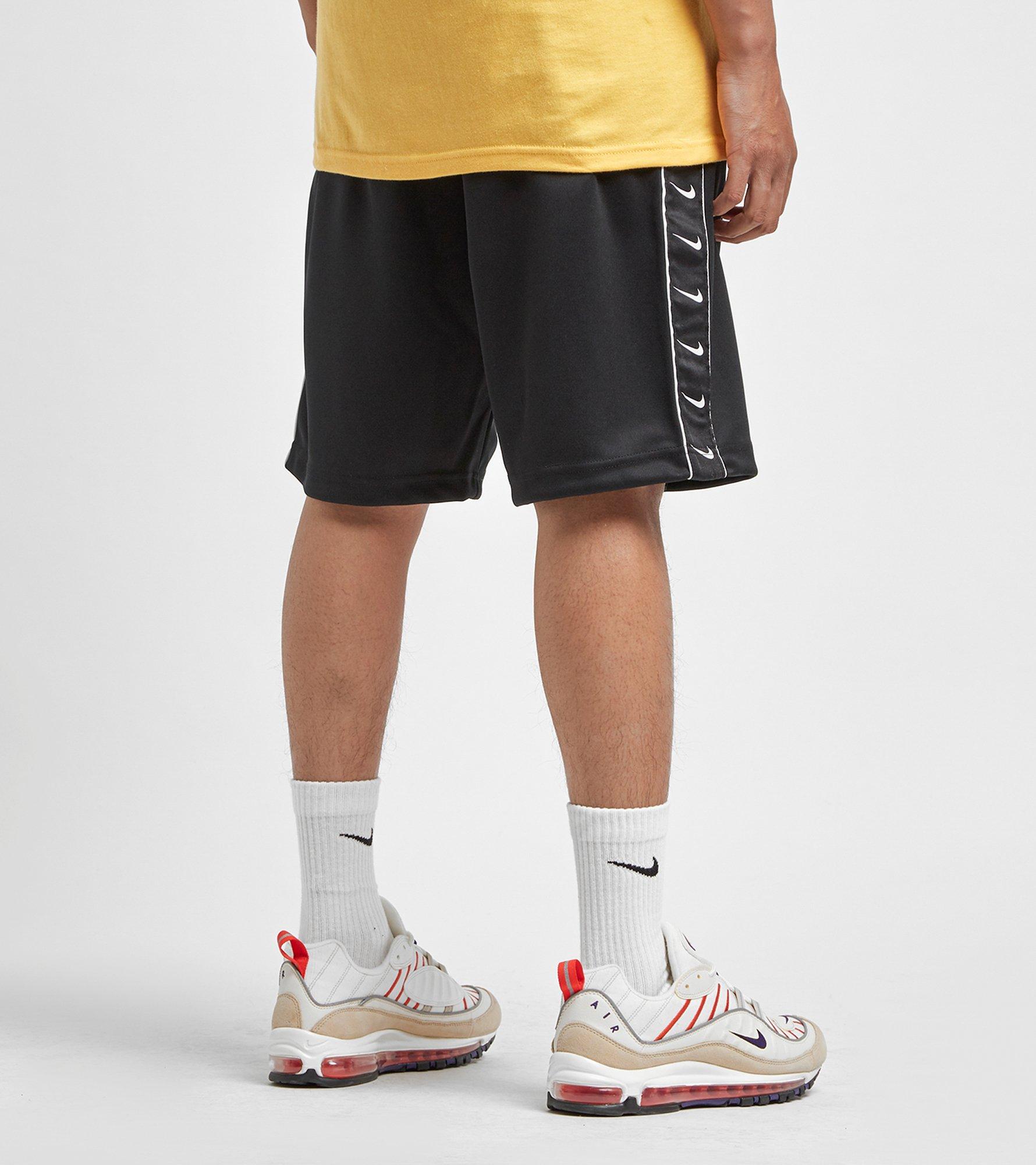 nike swoosh tape shorts