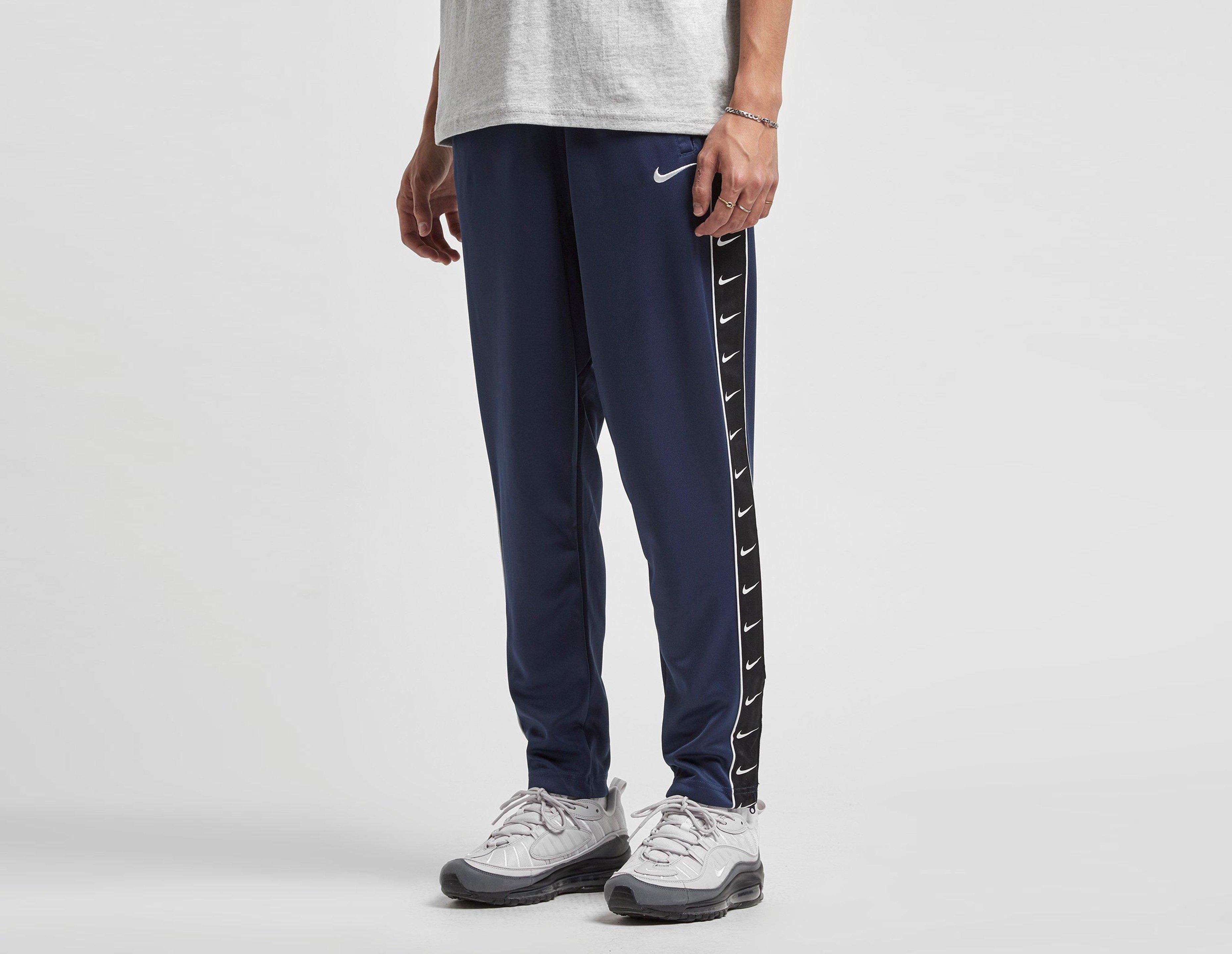 nike tape track pants