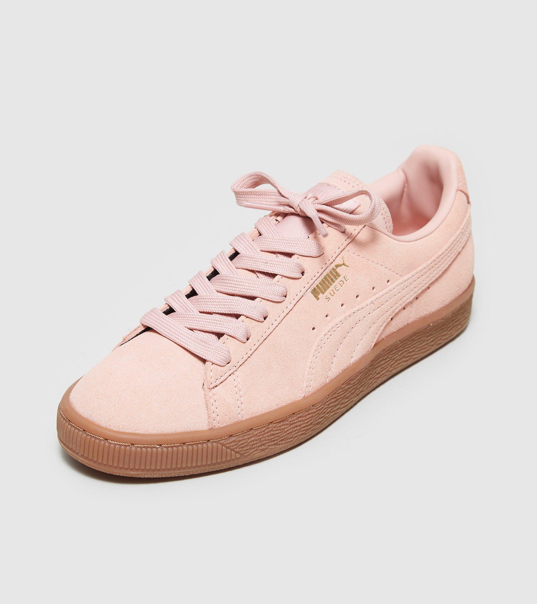 pink and gold pumas