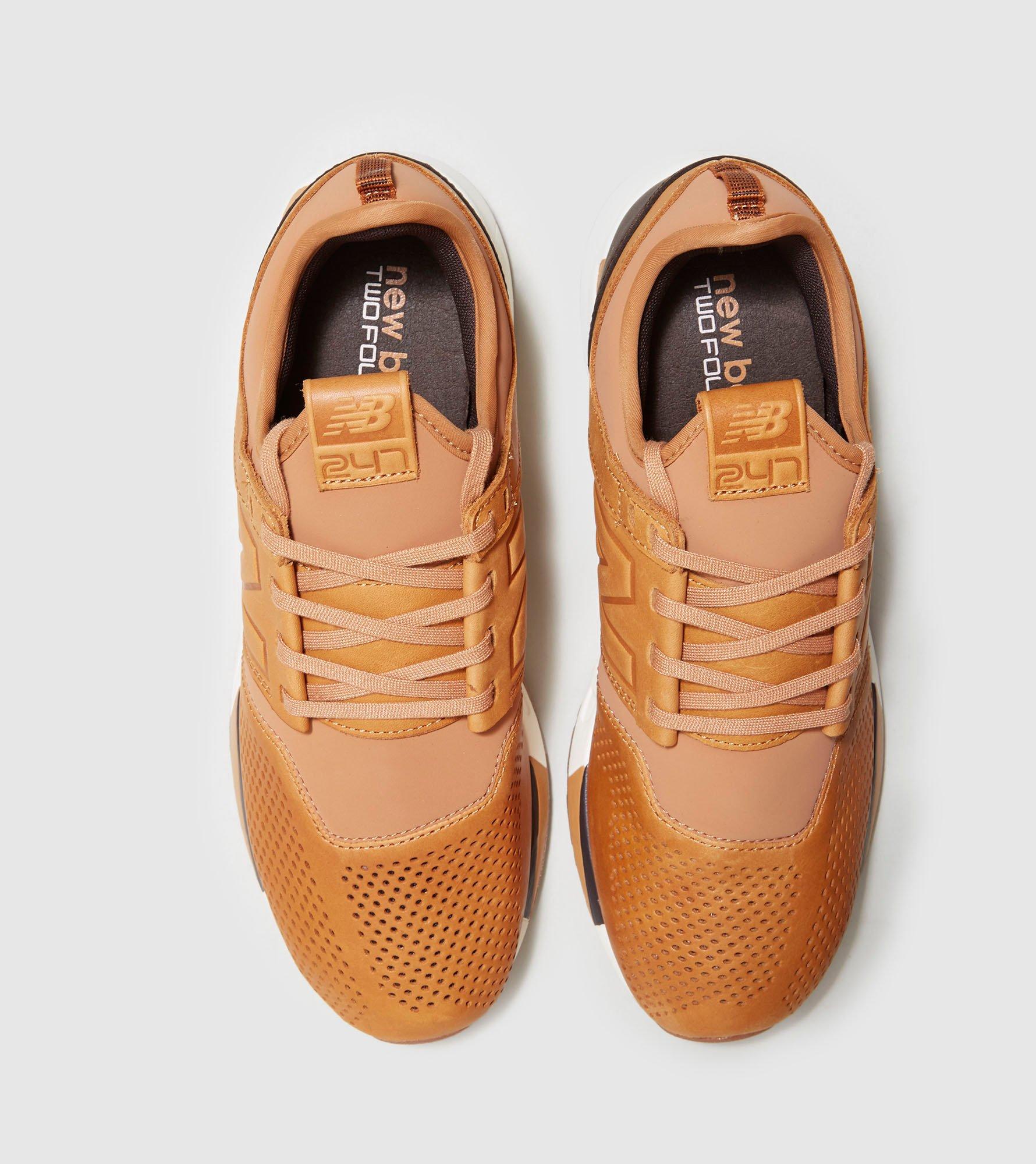 new balance revlite 247 luxe brown
