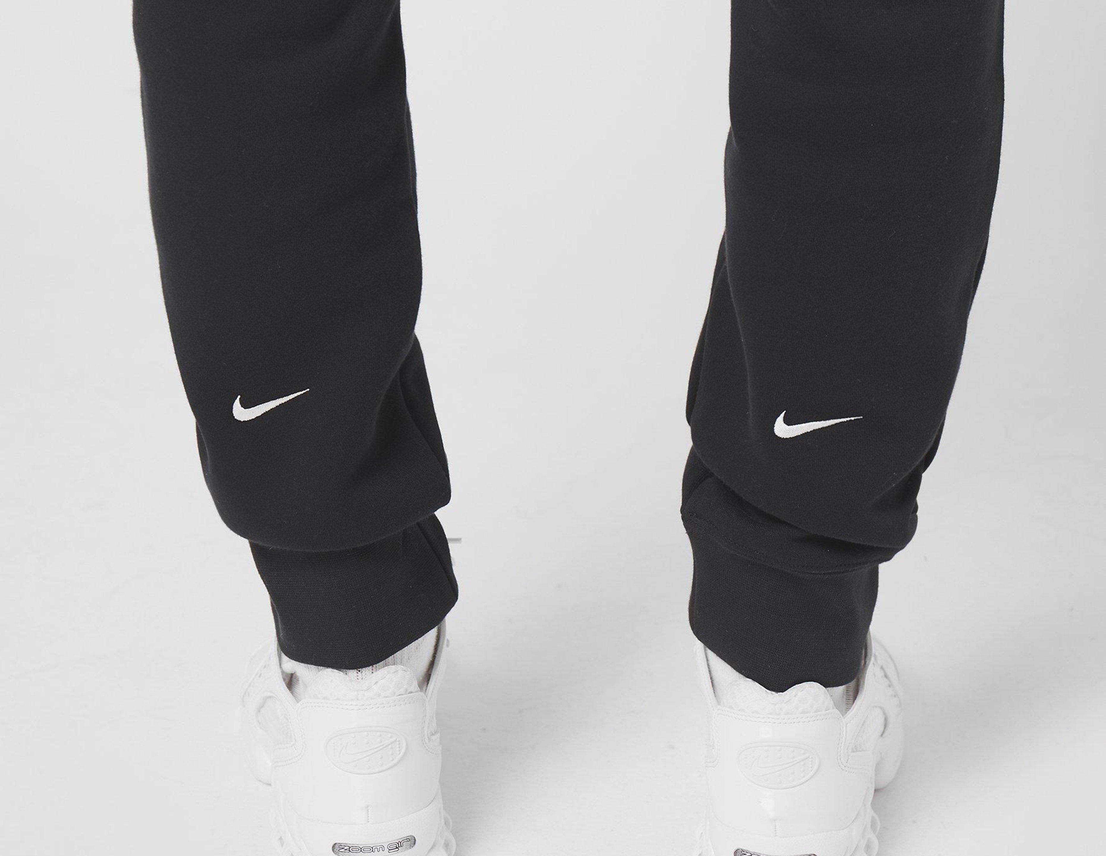 nike tick joggers