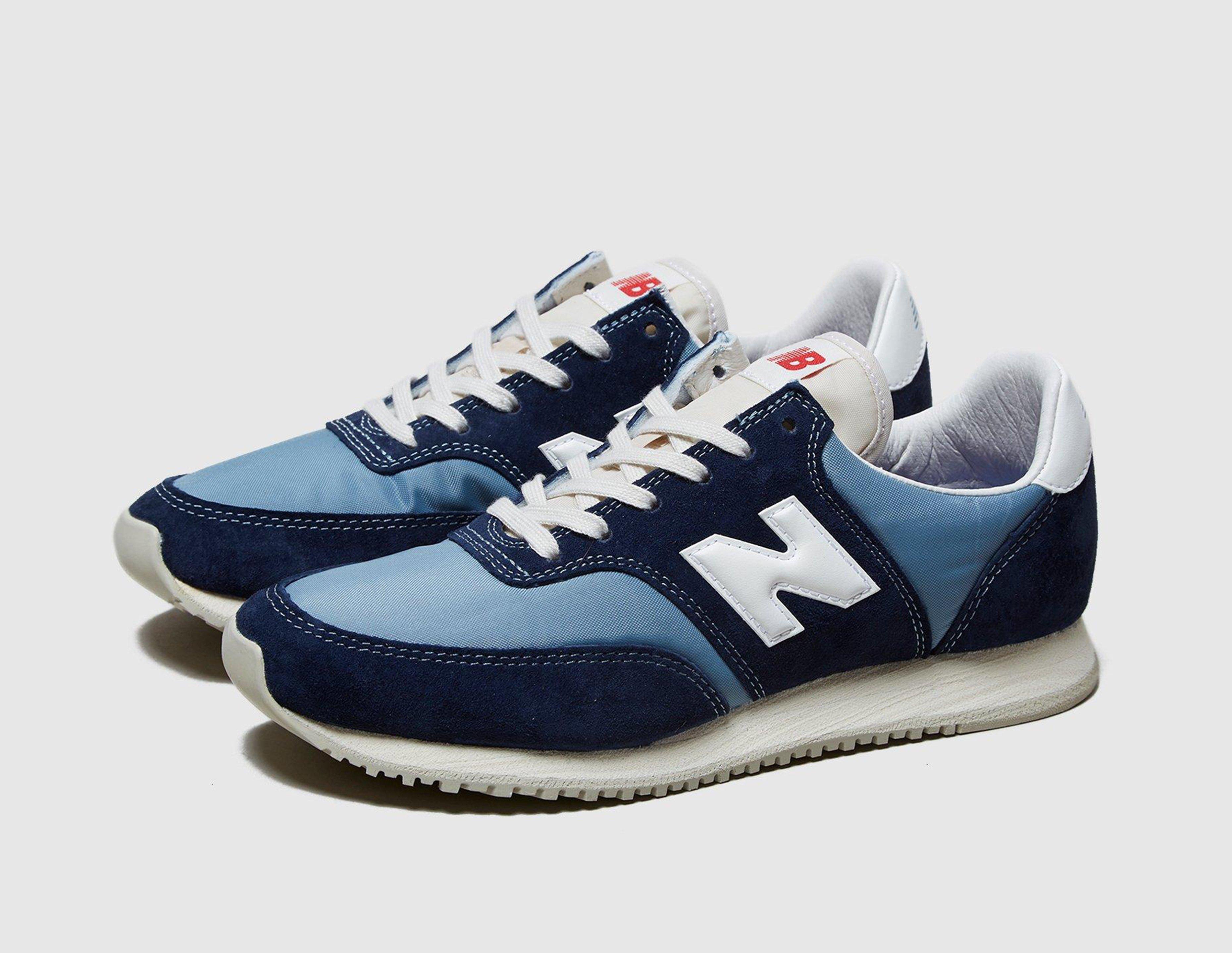new balance comp 100 blue