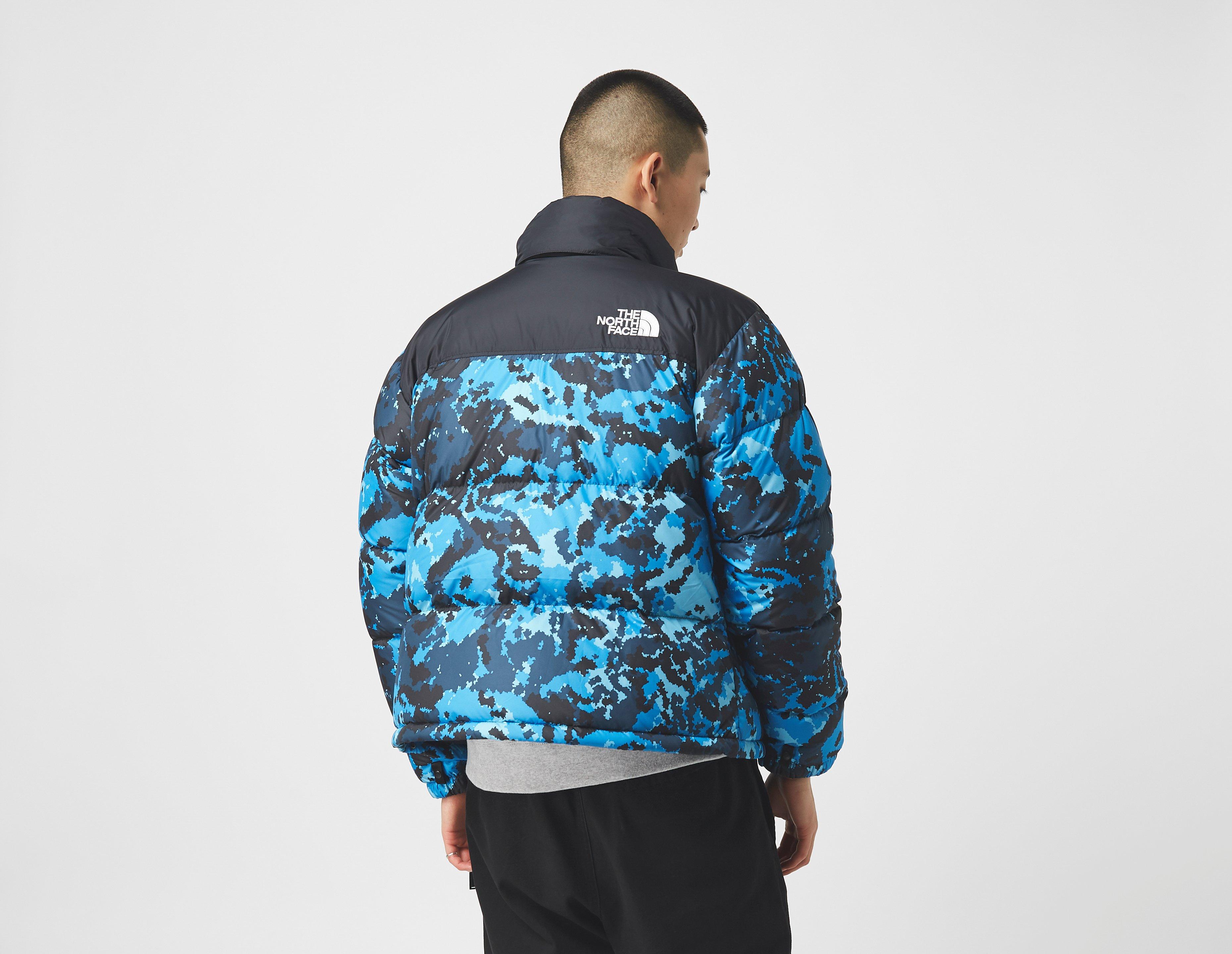 blue north face down jacket