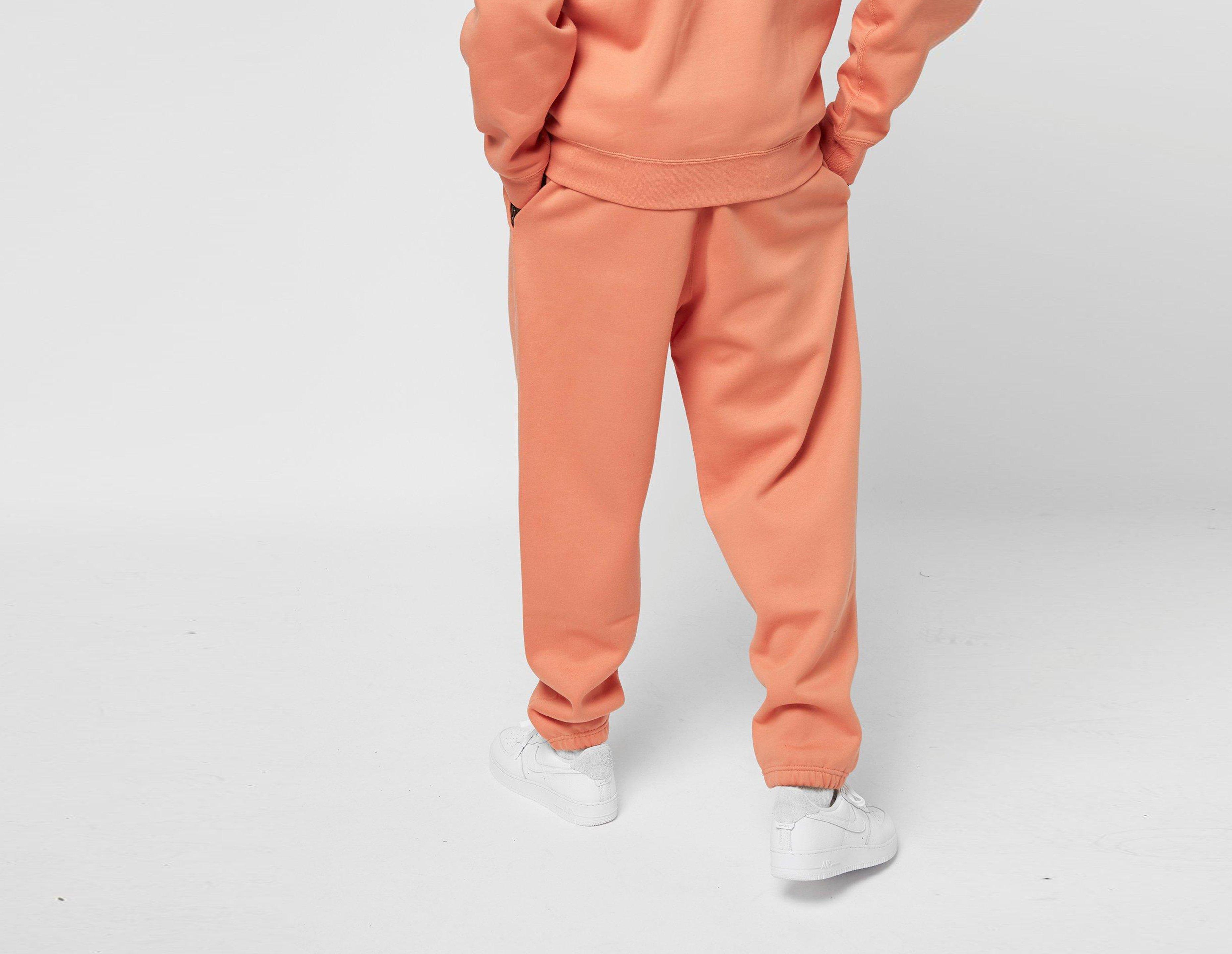 orange nike fleece pants