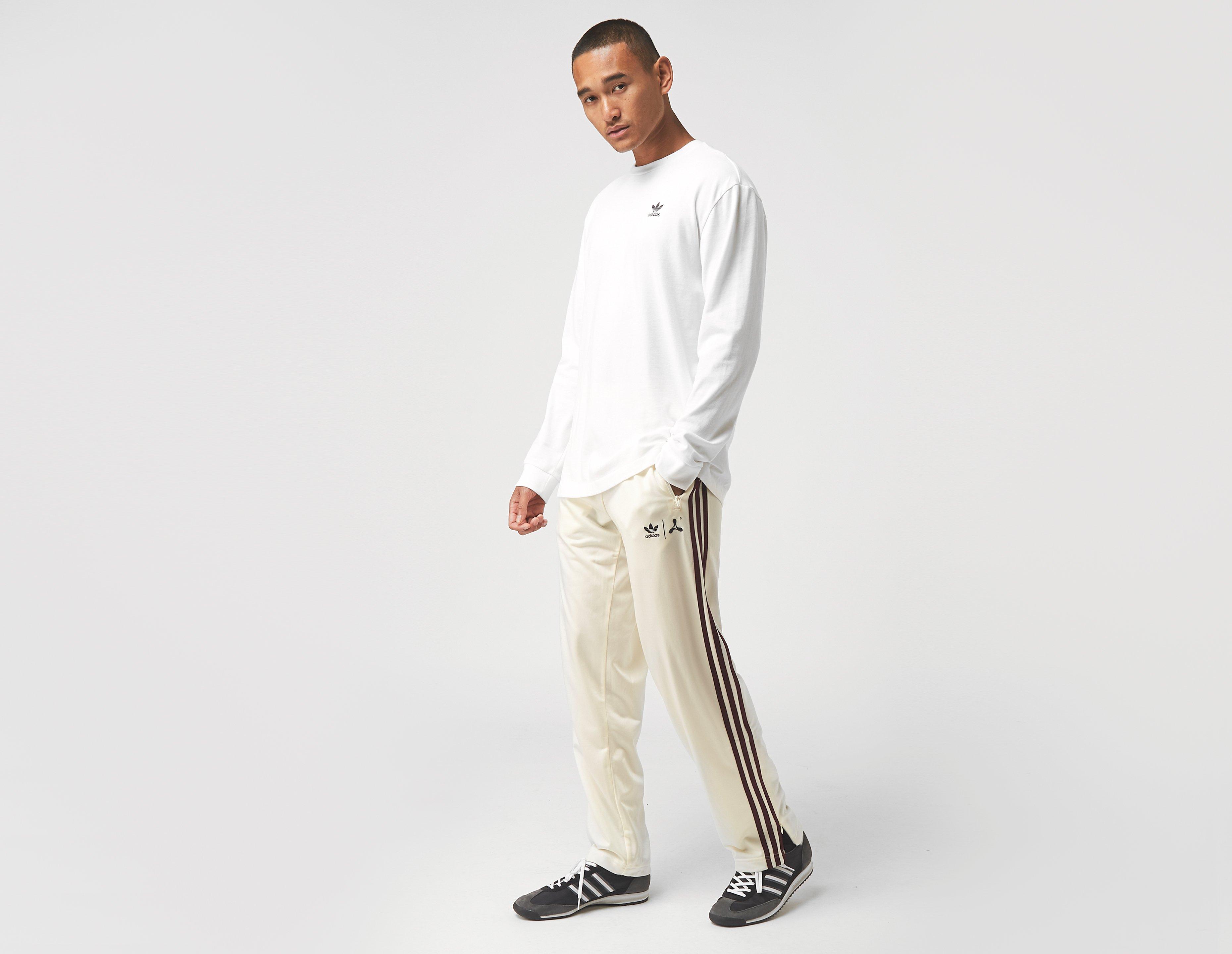 cream adidas track pants