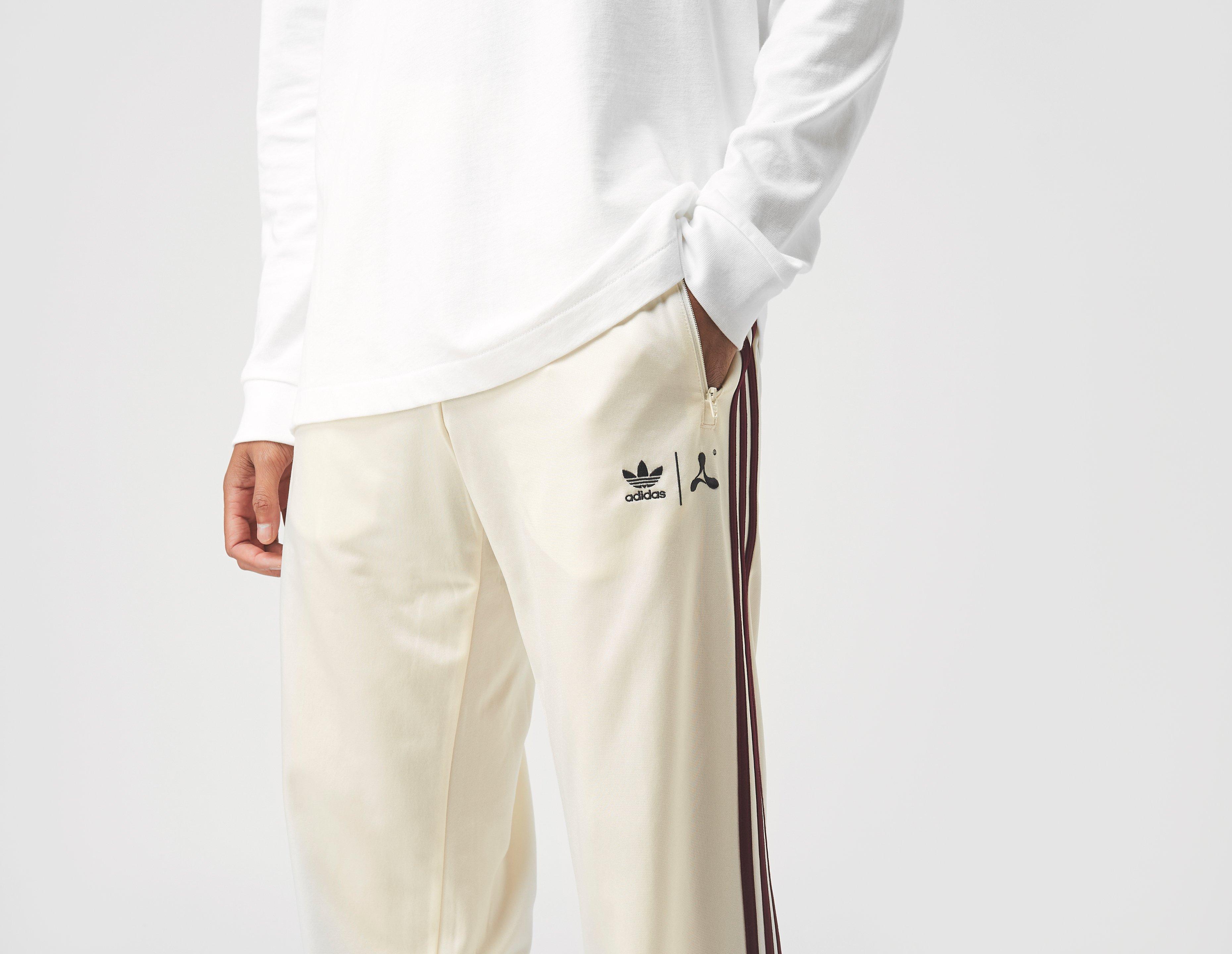 cream adidas track pants