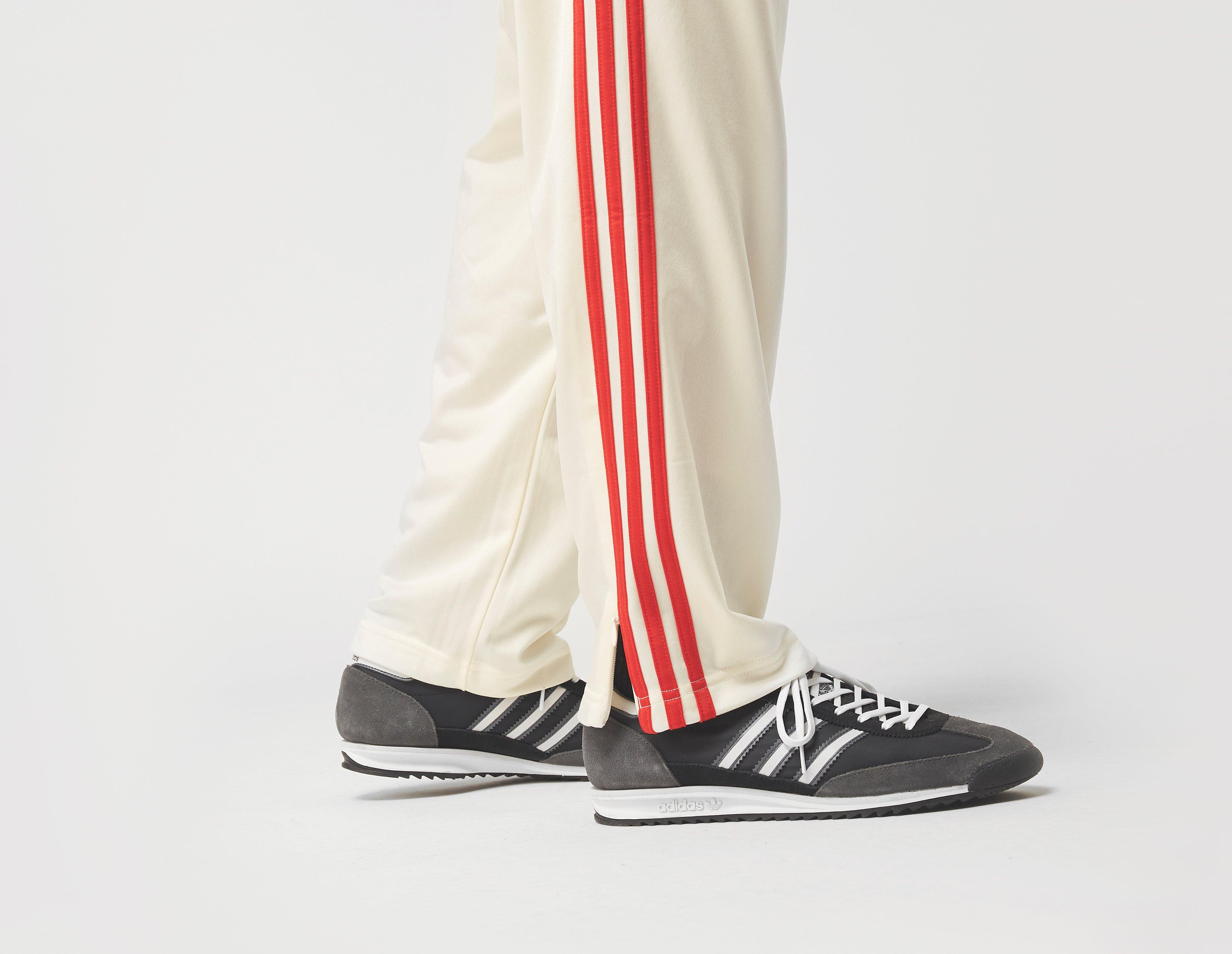 cream adidas track pants