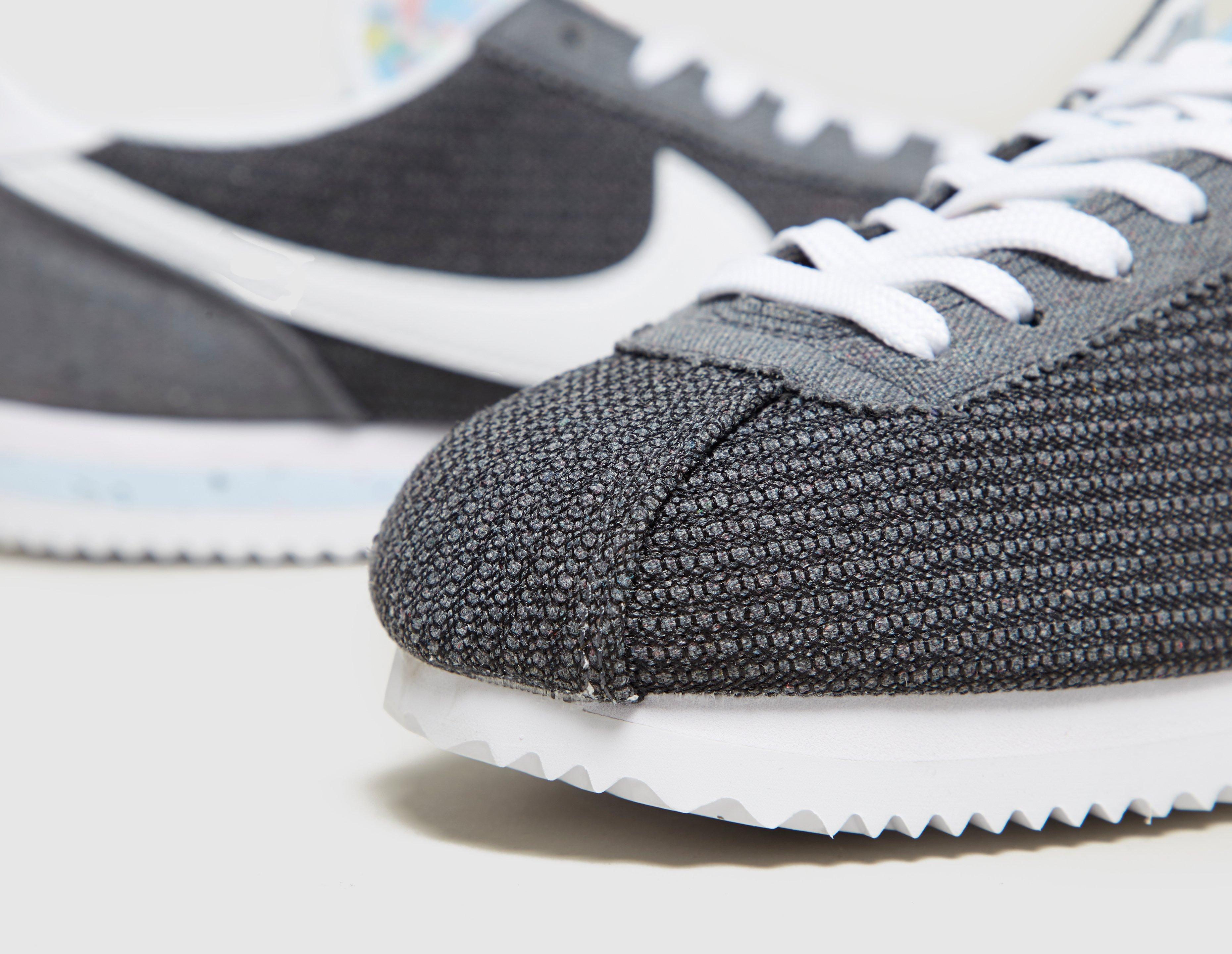 grey nike cortez womens
