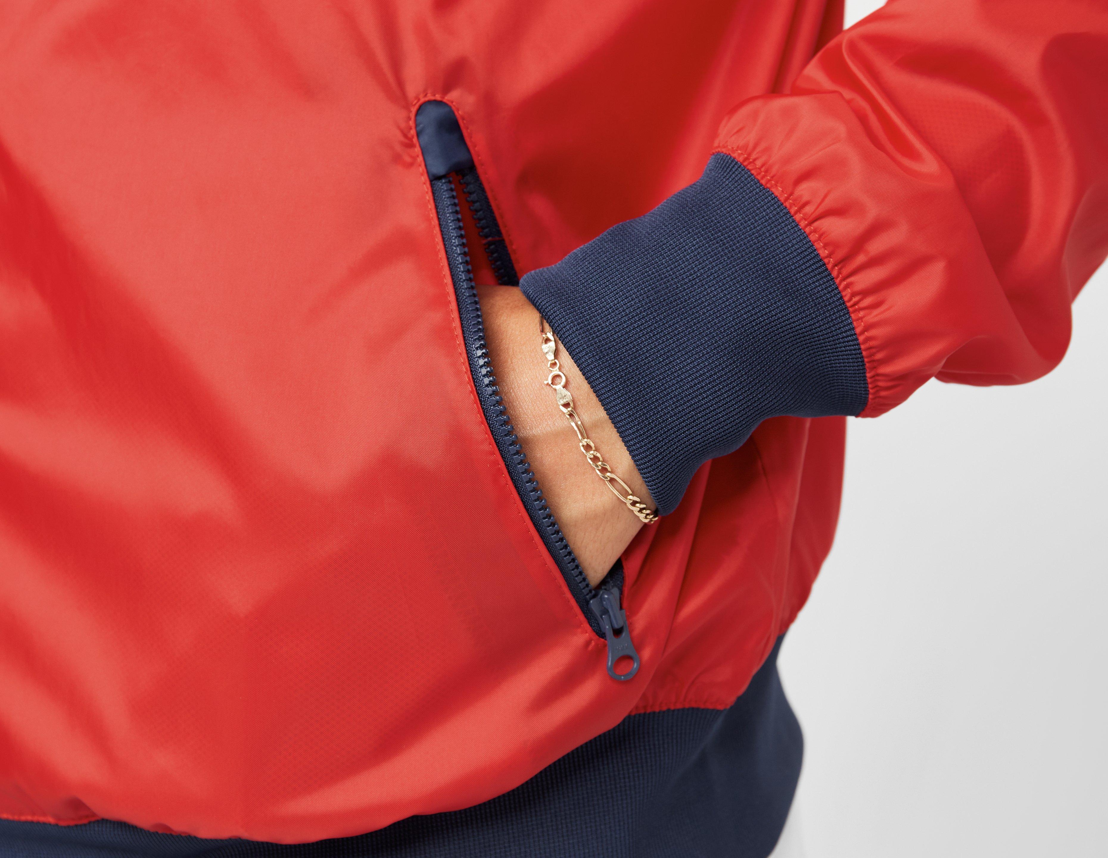 red and navy blue nike windbreaker