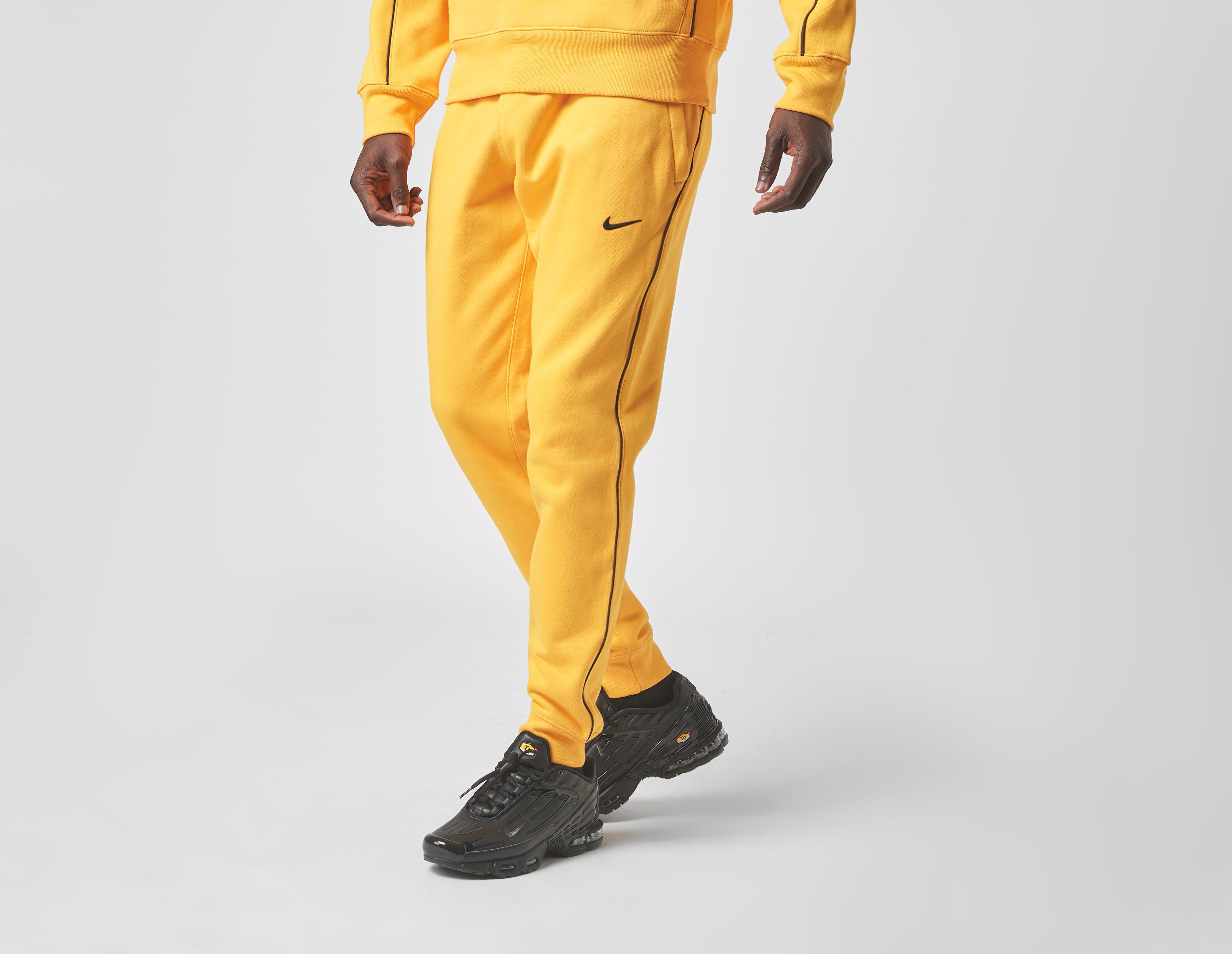 yellow nike pants
